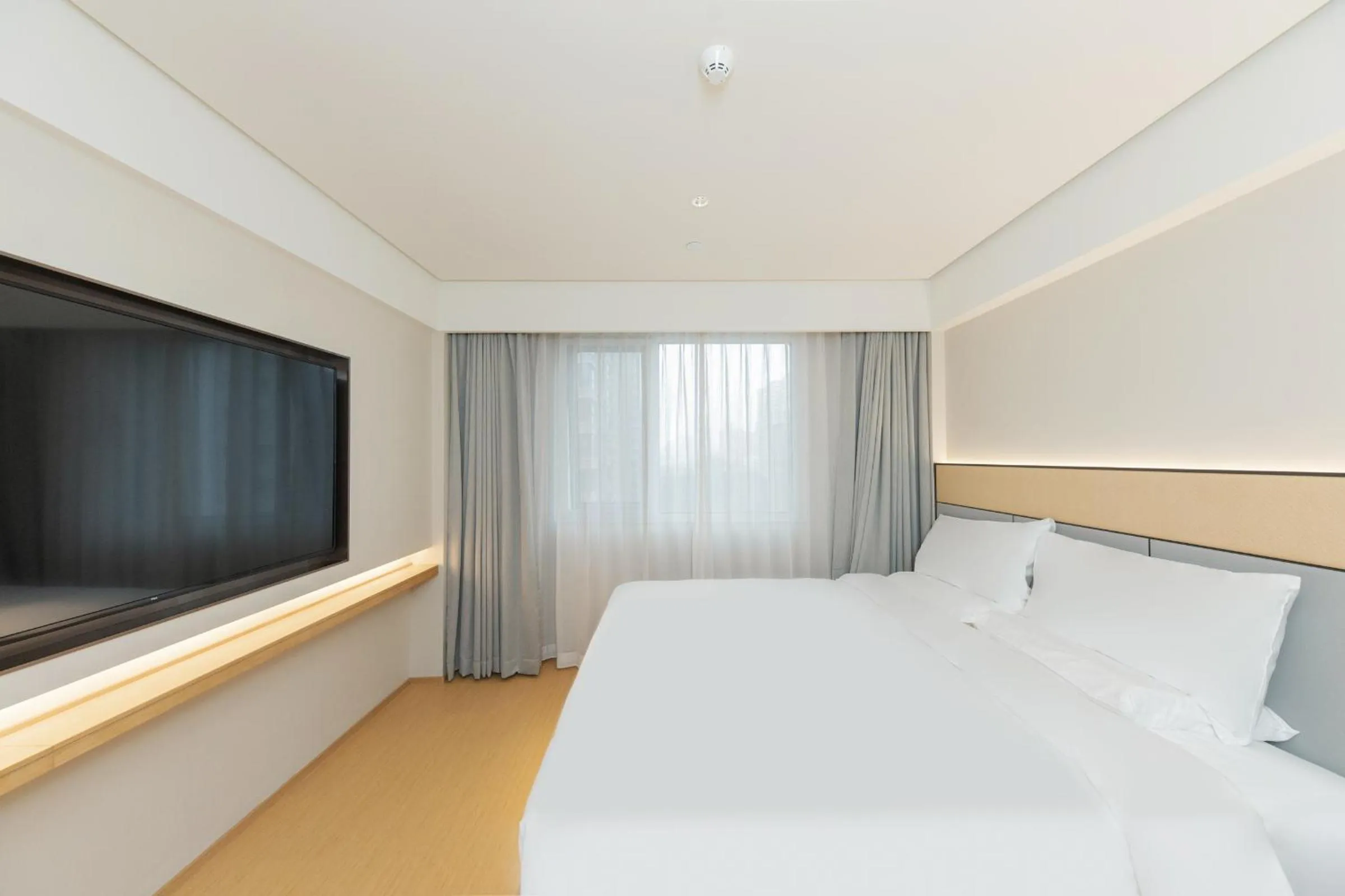 Bed in JI Hotel Beijing West Railway Station Lianbao Road