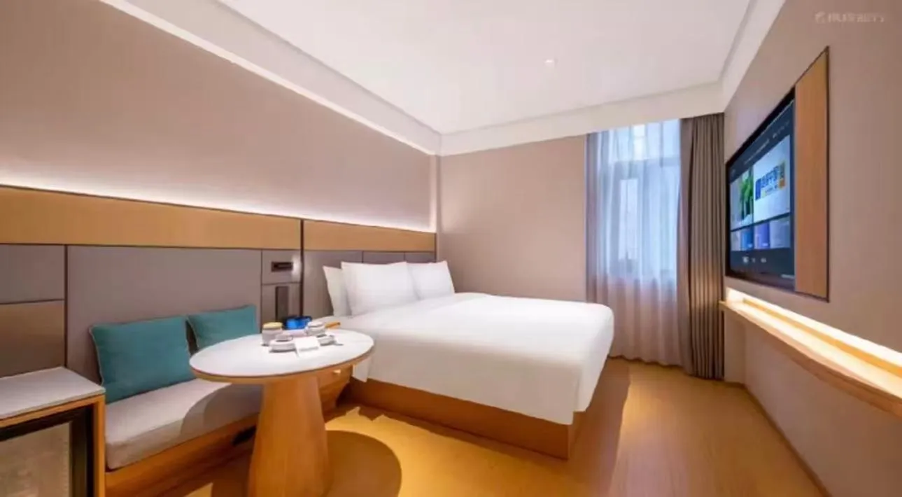 Bed in JI Hotel Beijing Yansha Sanyuan Bridge