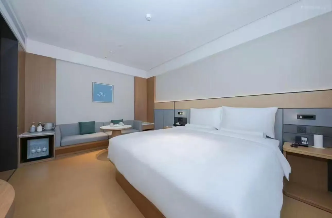 Bed in JI Hotel Beijing Yansha Sanyuan Bridge