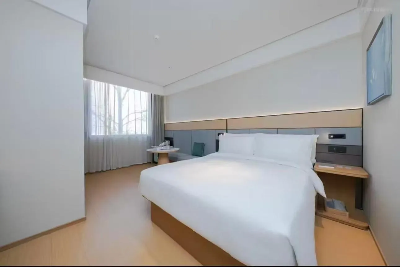 Bed in JI Hotel Beijing Yansha Sanyuan Bridge