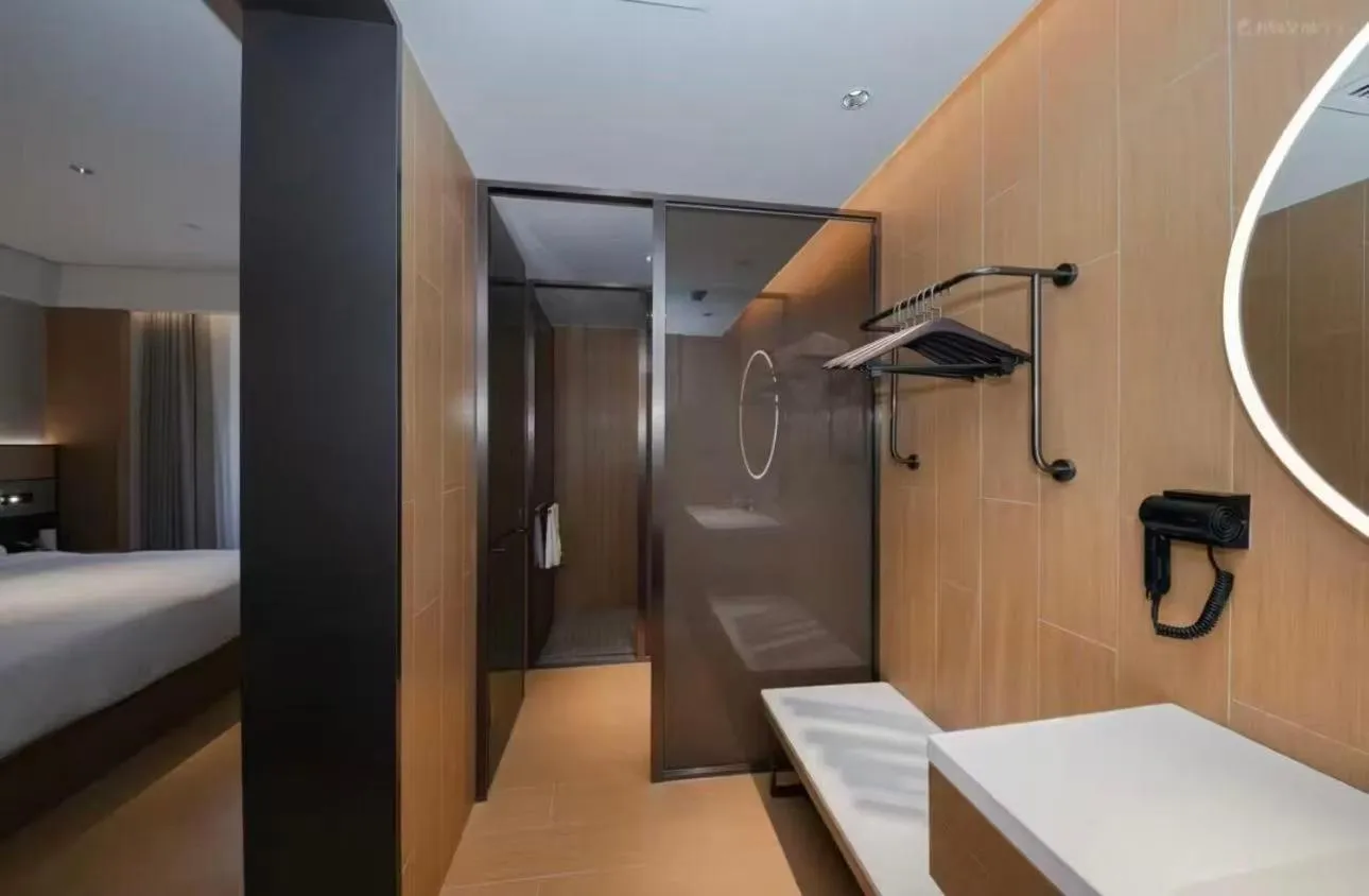 Bed in JI Hotel Beijing Yansha Sanyuan Bridge