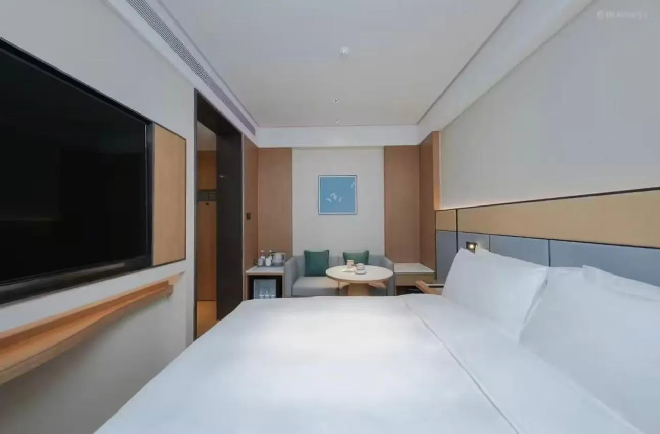 Bed in JI Hotel Beijing Yansha Sanyuan Bridge