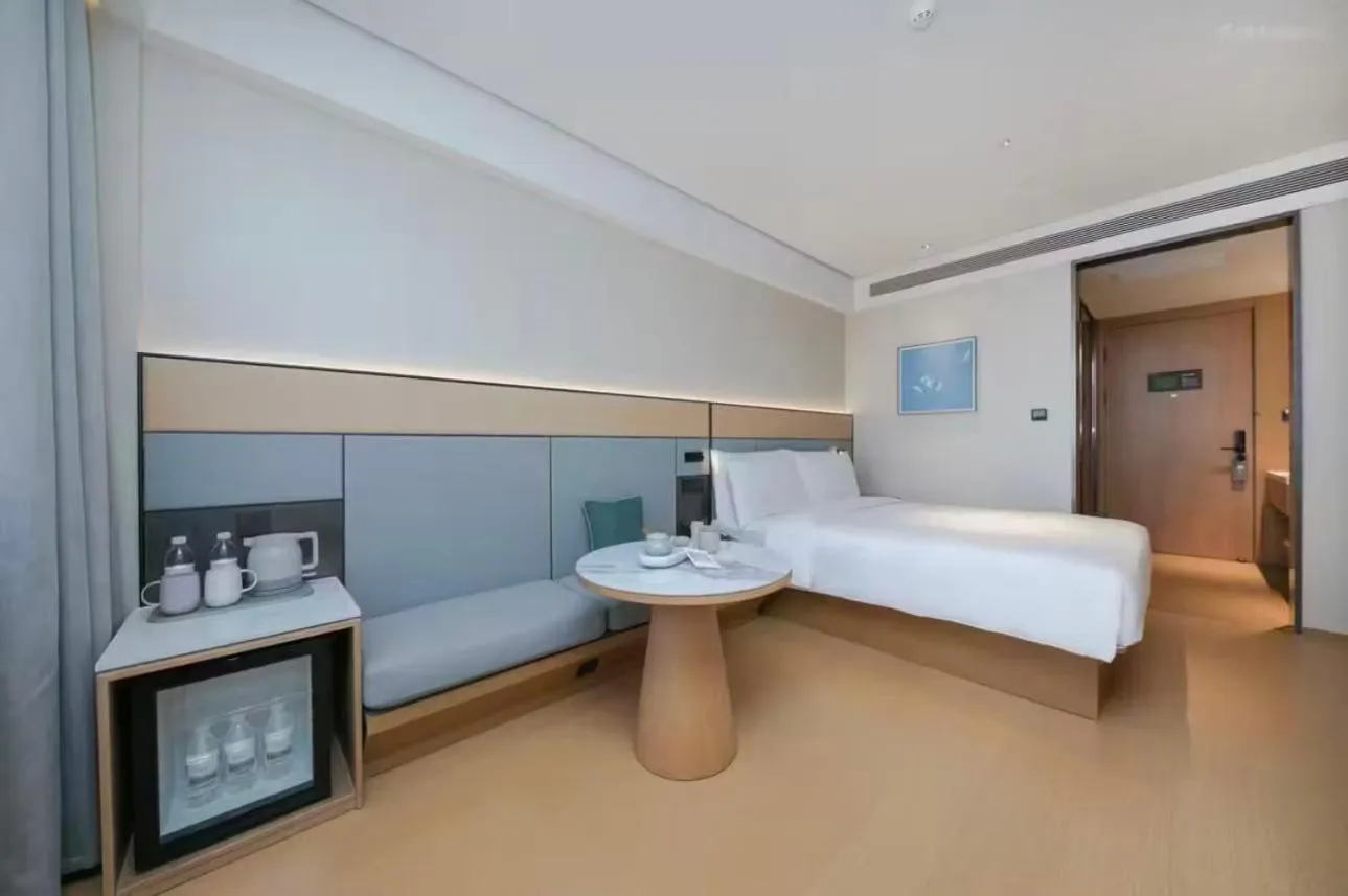 Bed in JI Hotel Beijing Yansha Sanyuan Bridge