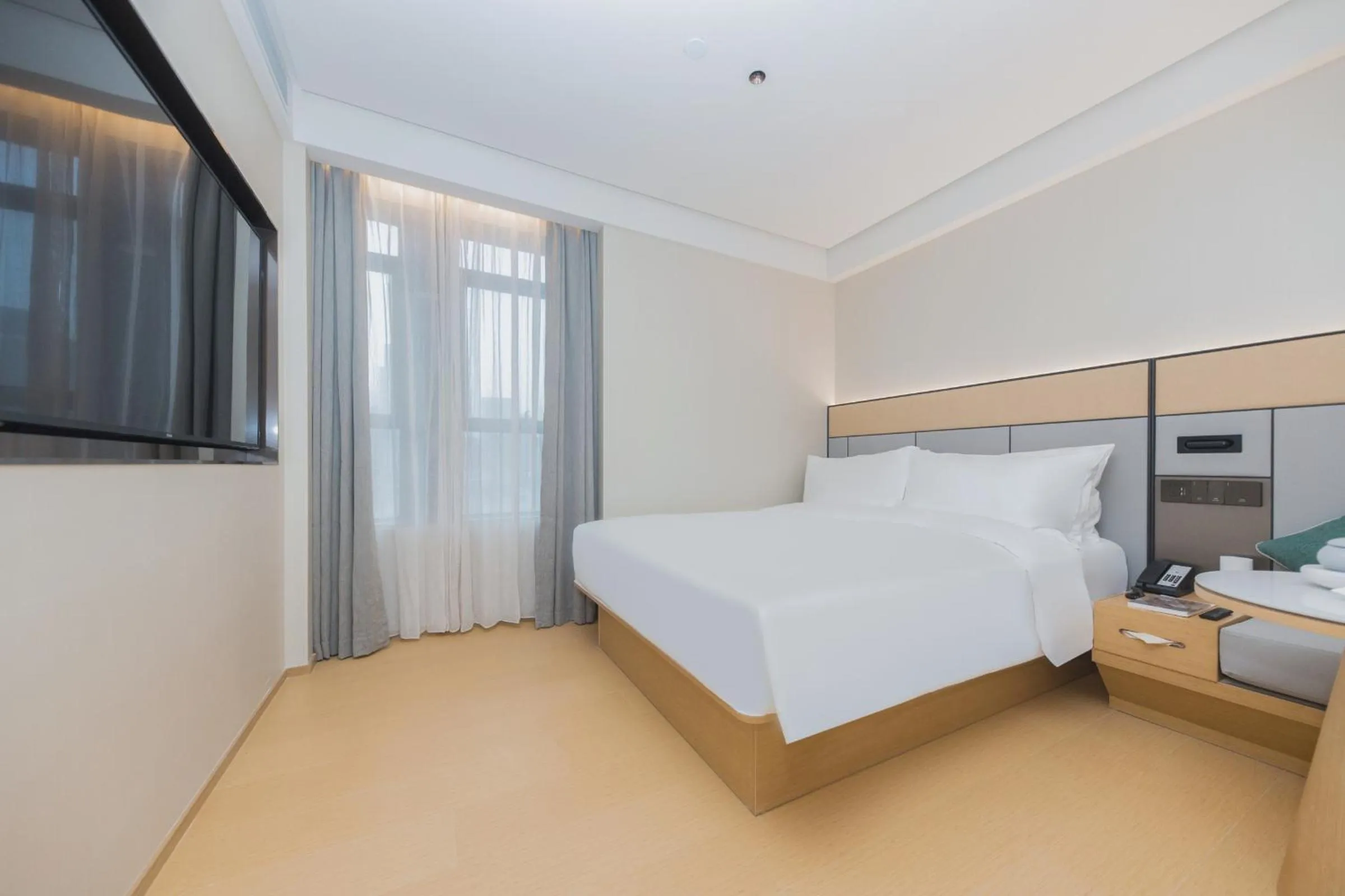 Bed in JI Hotel Hangzhou Linping Yintai City