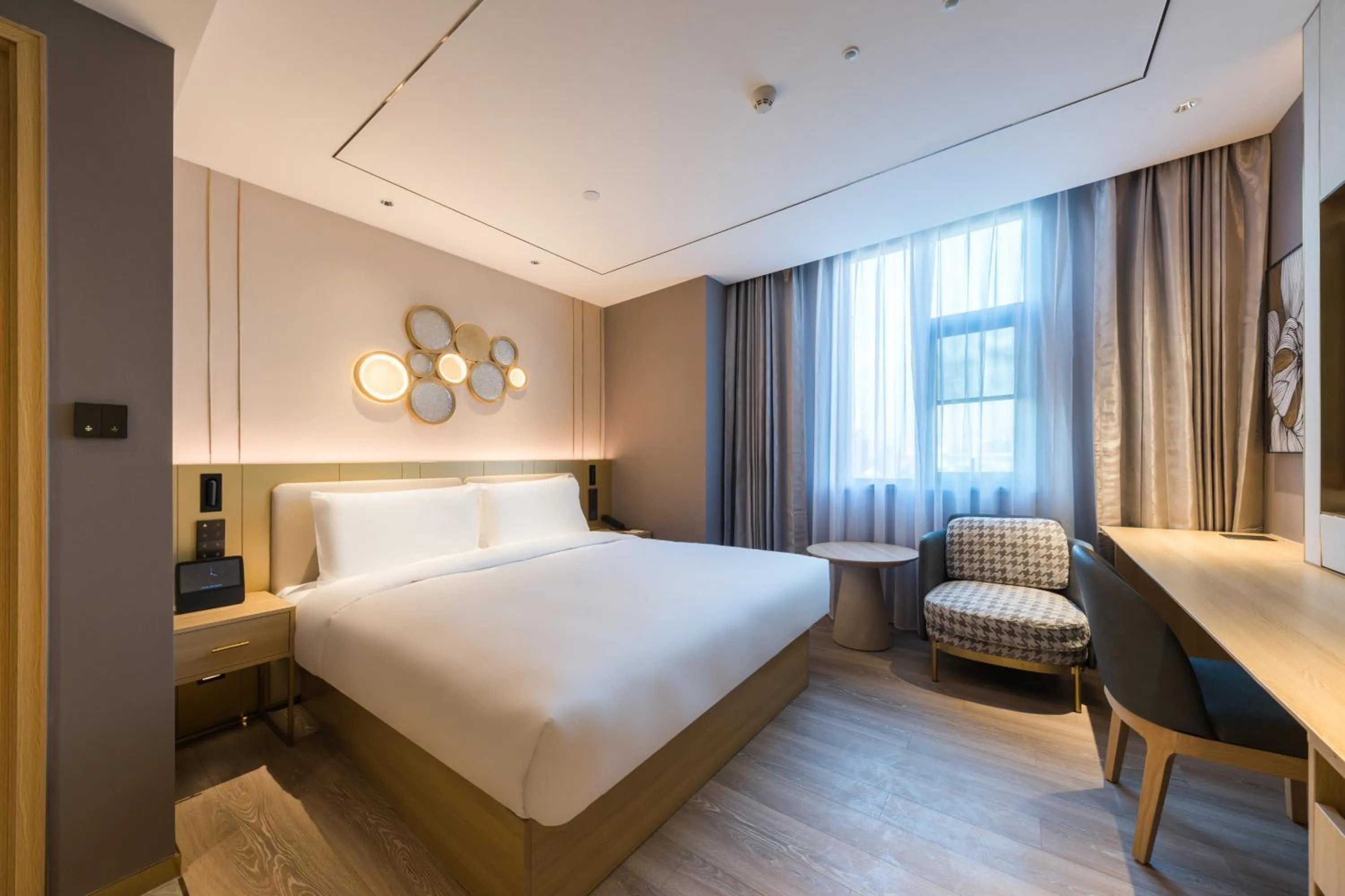 Bed in Orange Hotel Shanghai World Expo Center