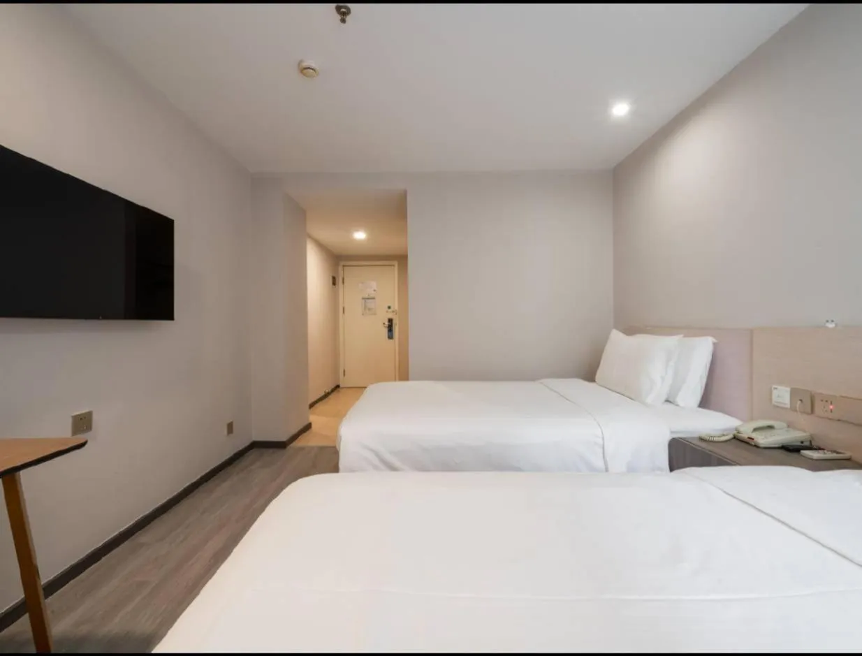 Bed in Hanting Hotel Shenzhen Taian Subway Station