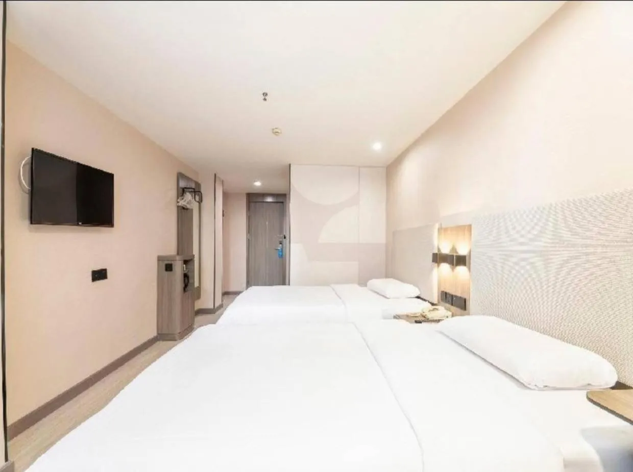 Bed in Hanting Hotel Shenzhen Taian Subway Station