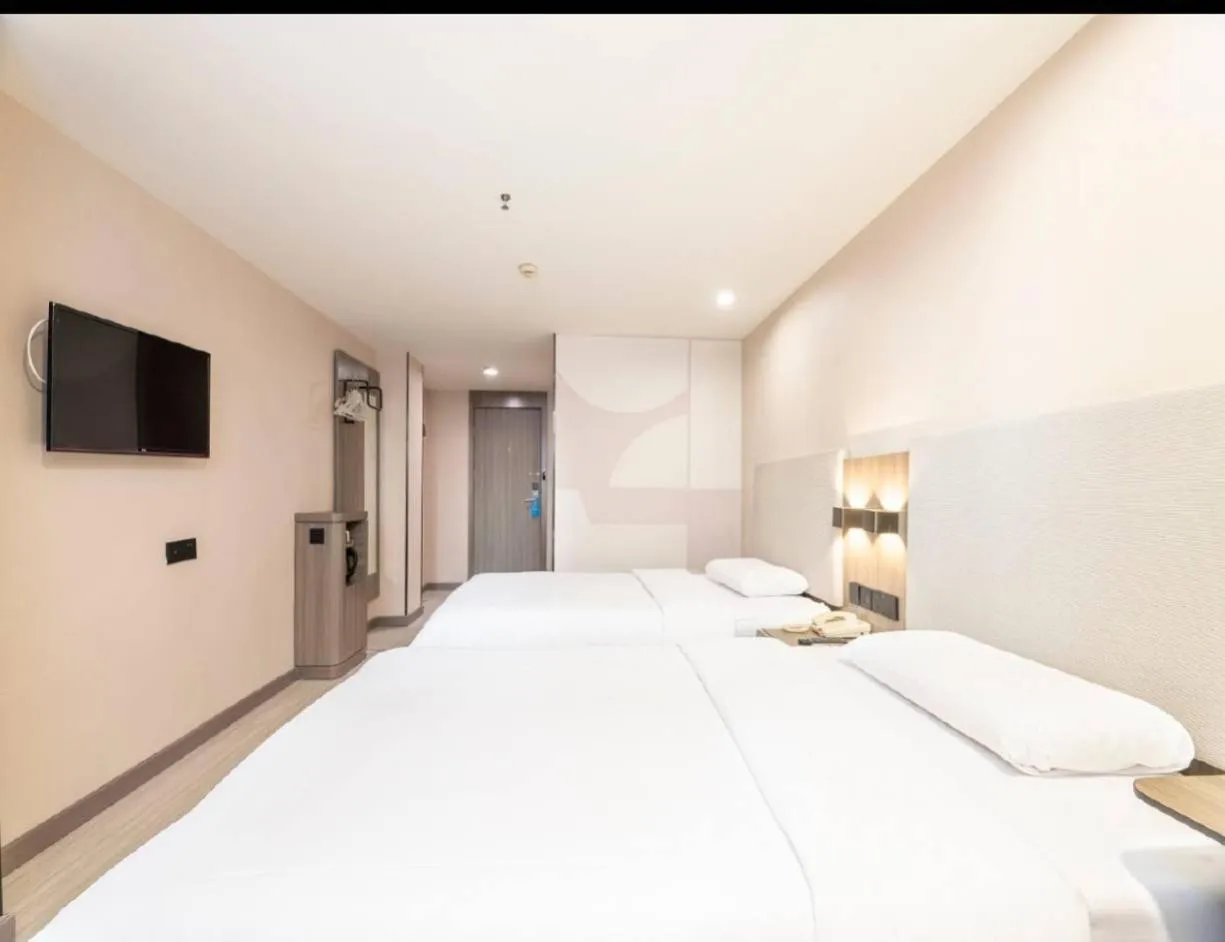 Bed in Hanting Hotel Shenzhen Taian Subway Station