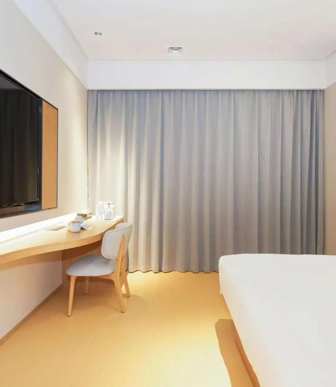 Bed in JI Hotel Guangzhou Fangcun Huadiwan