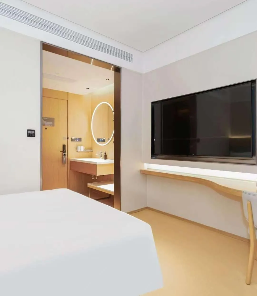 Bed in JI Hotel Guangzhou Fangcun Huadiwan