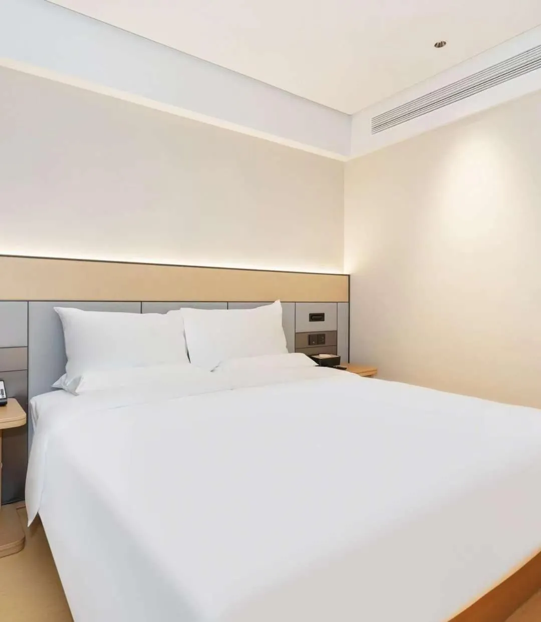 Bed in JI Hotel Guangzhou Fangcun Huadiwan