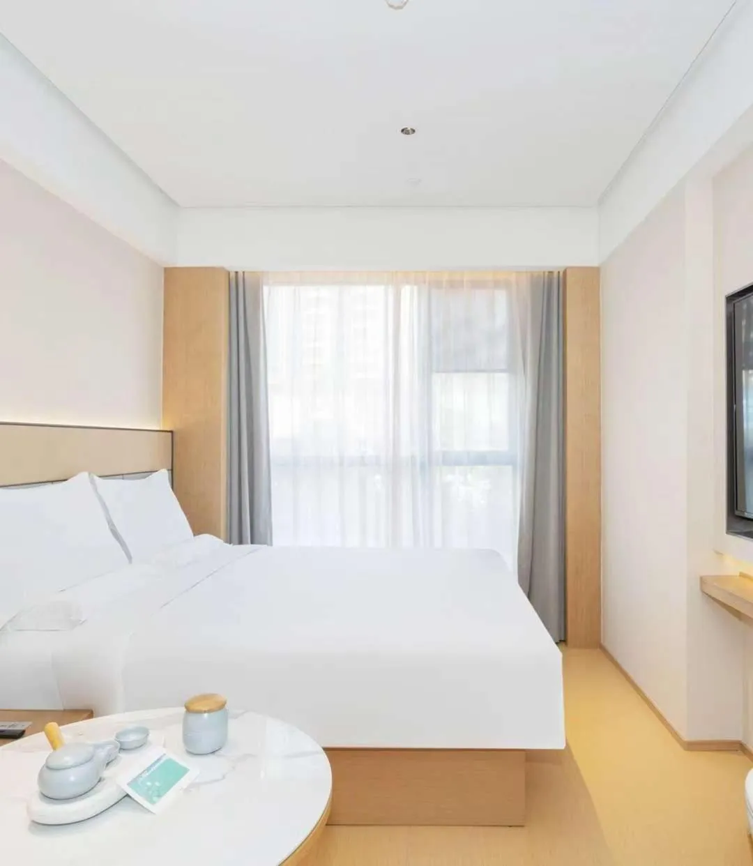 Bed in JI Hotel Guangzhou Fangcun Huadiwan