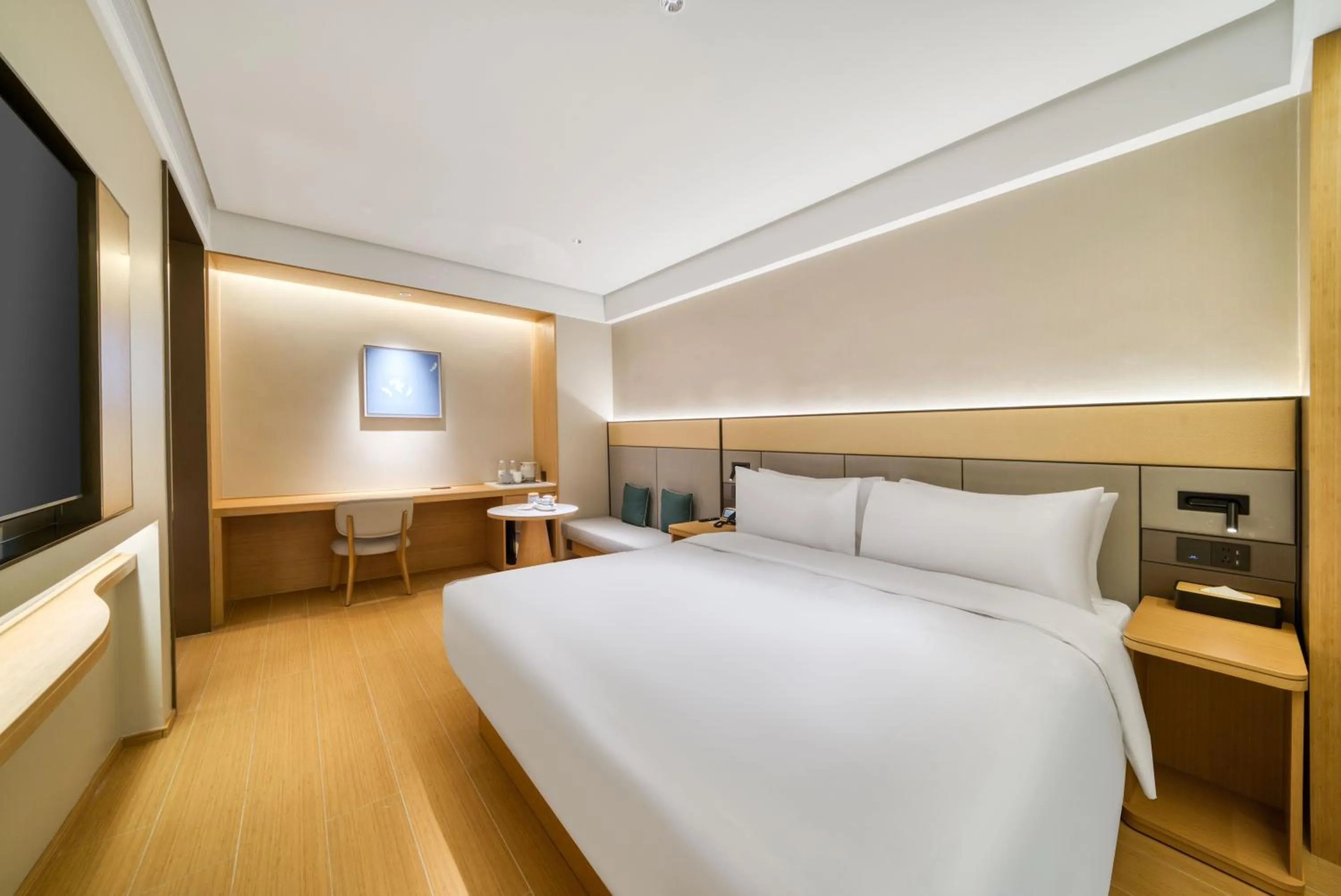 Bed in JI Hotel Shanghai Chongming Changxing Island