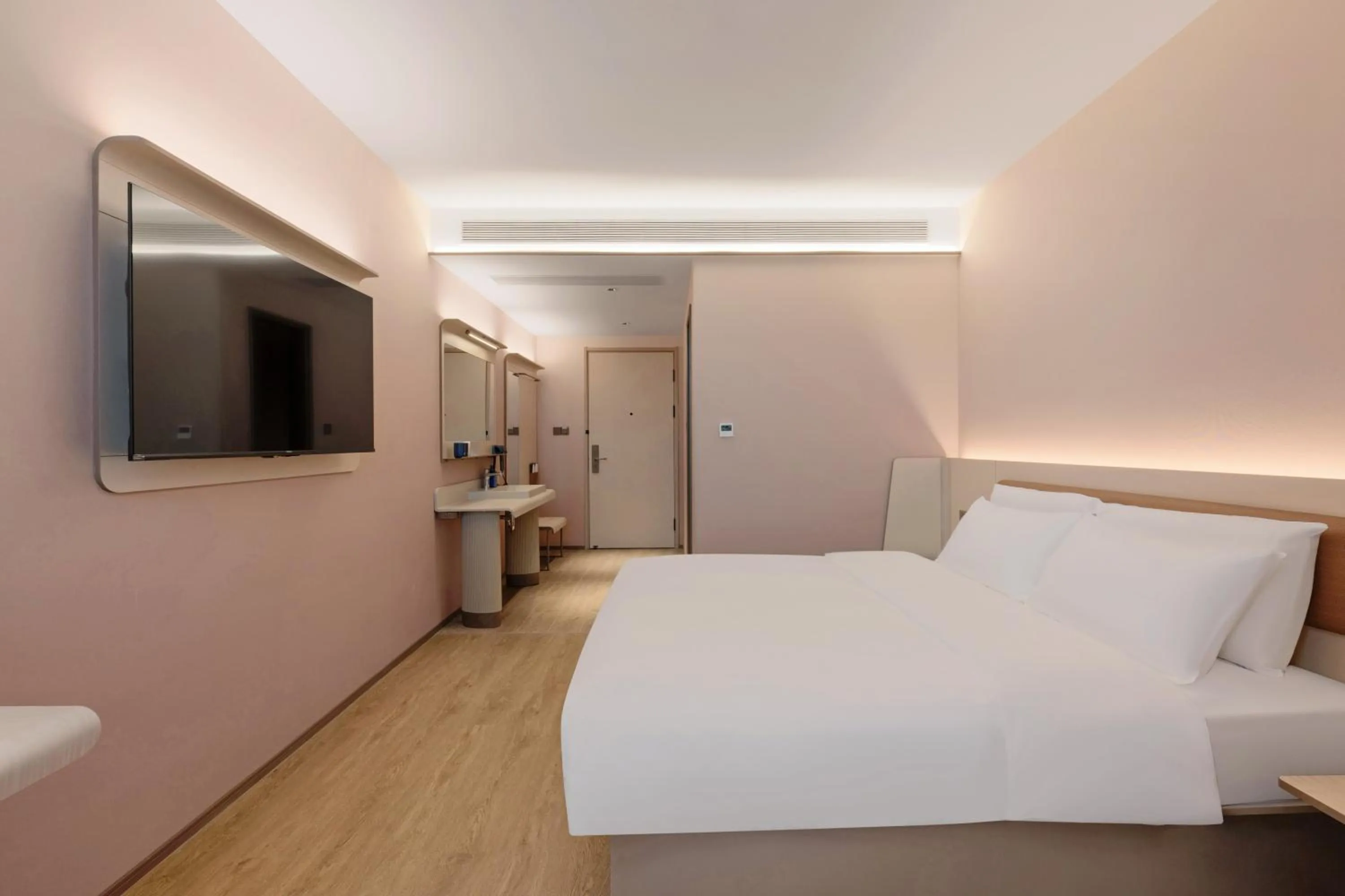 Bed in Hanting Hotel Chongqing Lianglukou Caiyuanba