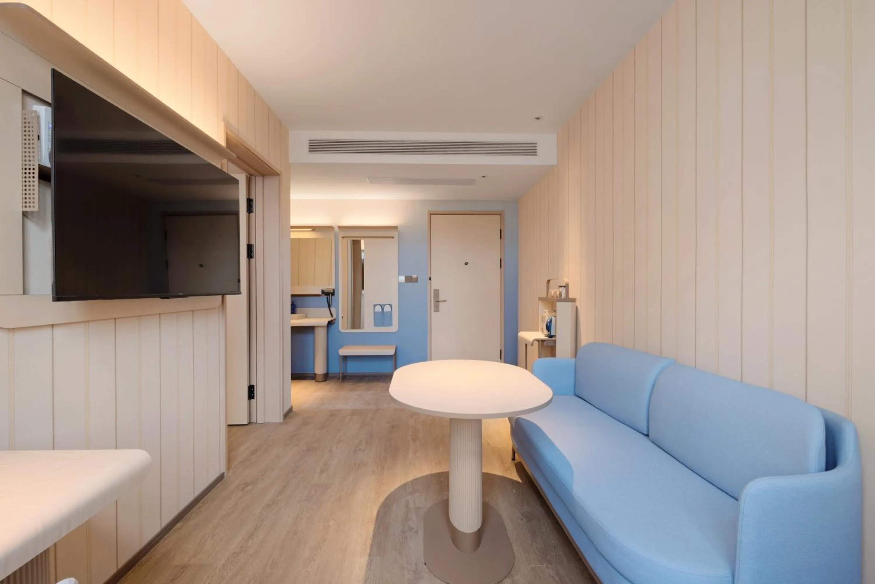 Living room in Hanting Hotel Chongqing Lianglukou Caiyuanba