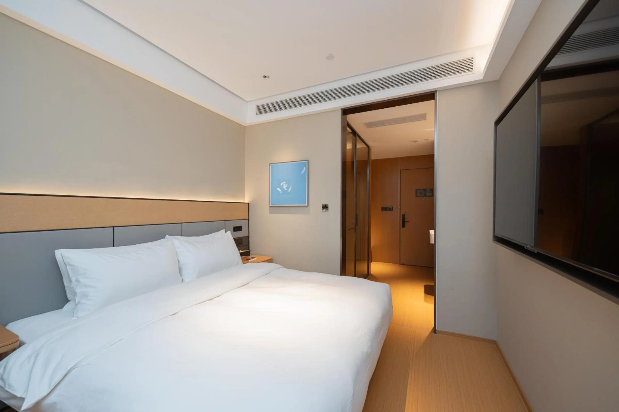 Bed in JI Hotel Guangzhou Panyu Chimelong Wanbo Center