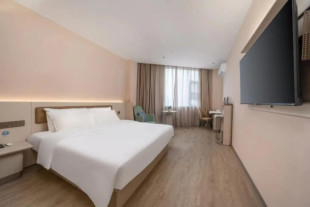 Photo of the whole room, Bed in Hanting Hotel Shenzhen Shiyan Bus Station