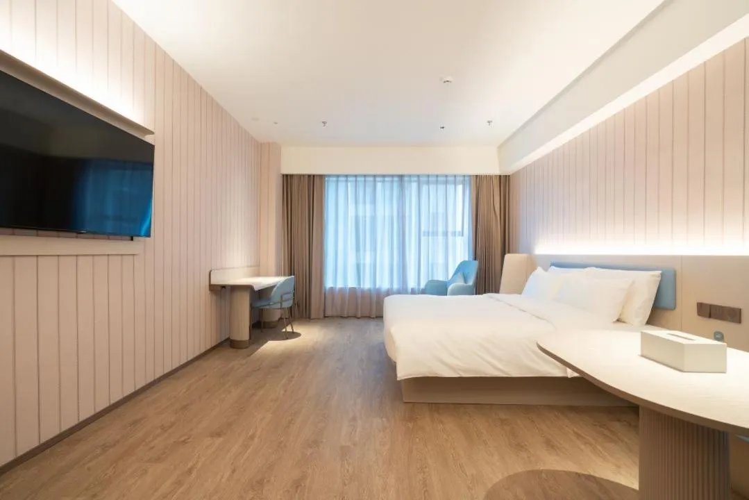 Photo of the whole room, Bed in Hanting Hotel Shenzhen Shiyan Bus Station