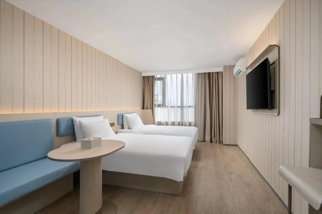 Bed in Hanting Hotel Shenzhen Shiyan Bus Station