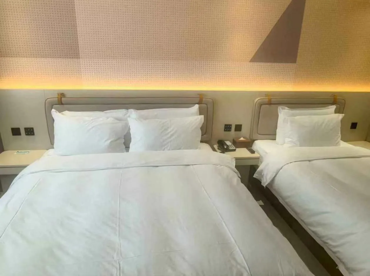 Bed in Orange Hotel Shanghai Xujiahui Damuqiao Road