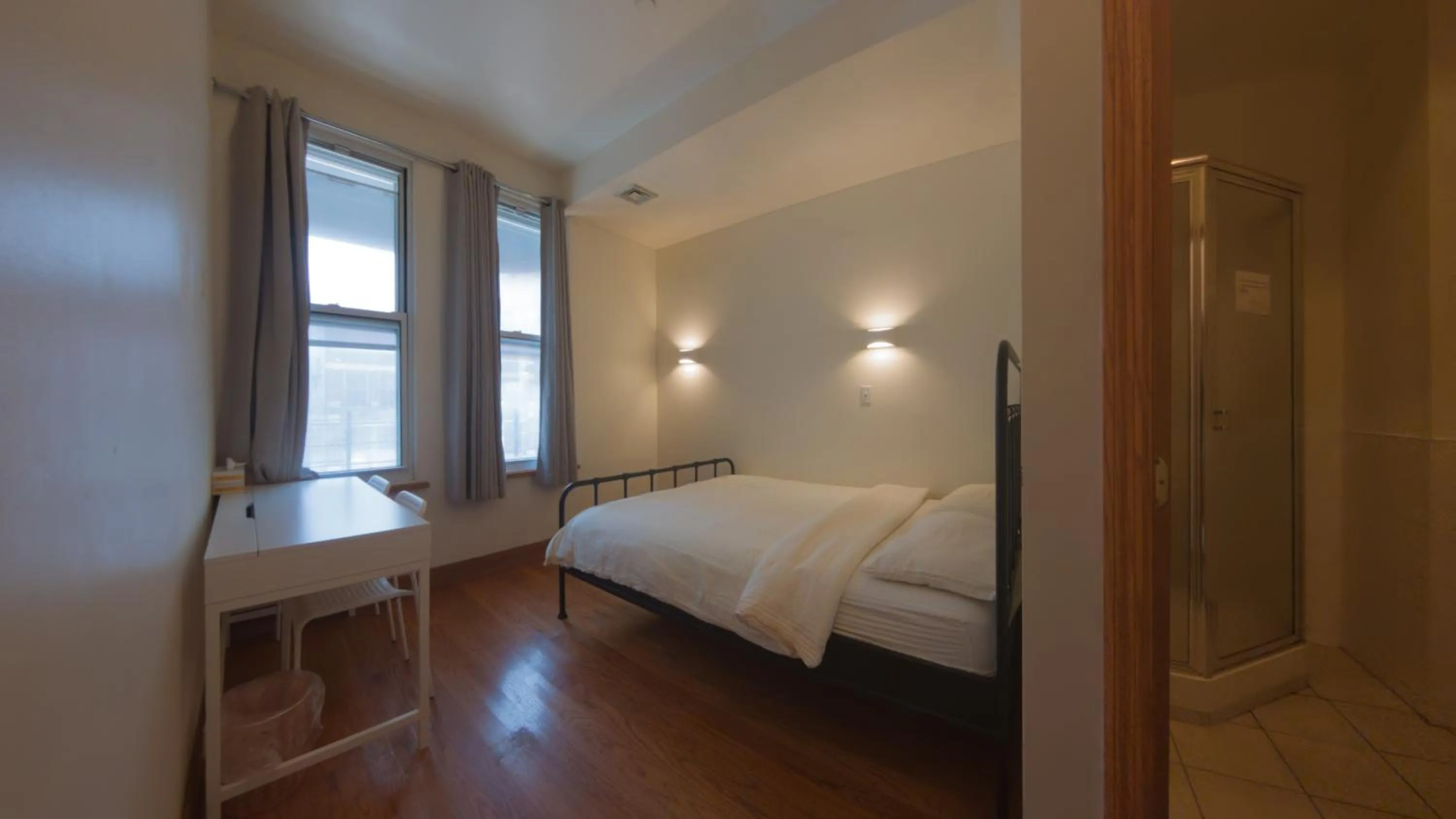 Bed in U.S. Pacific Hotel