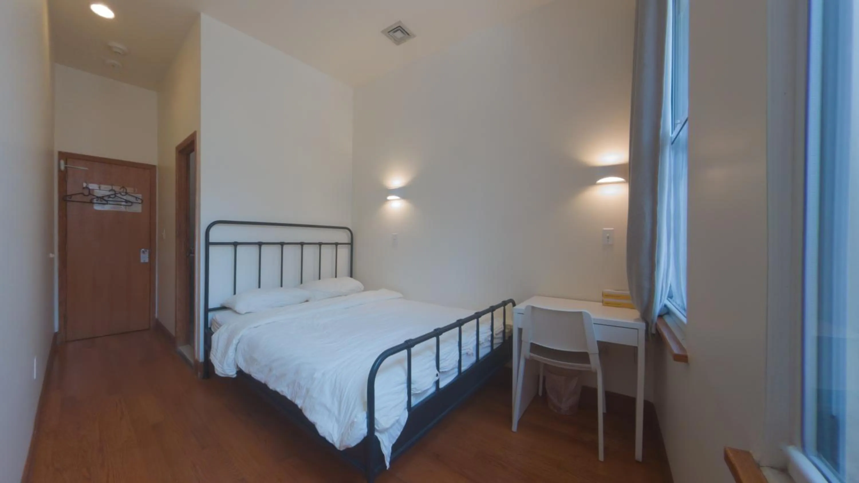 Bed in U.S. Pacific Hotel