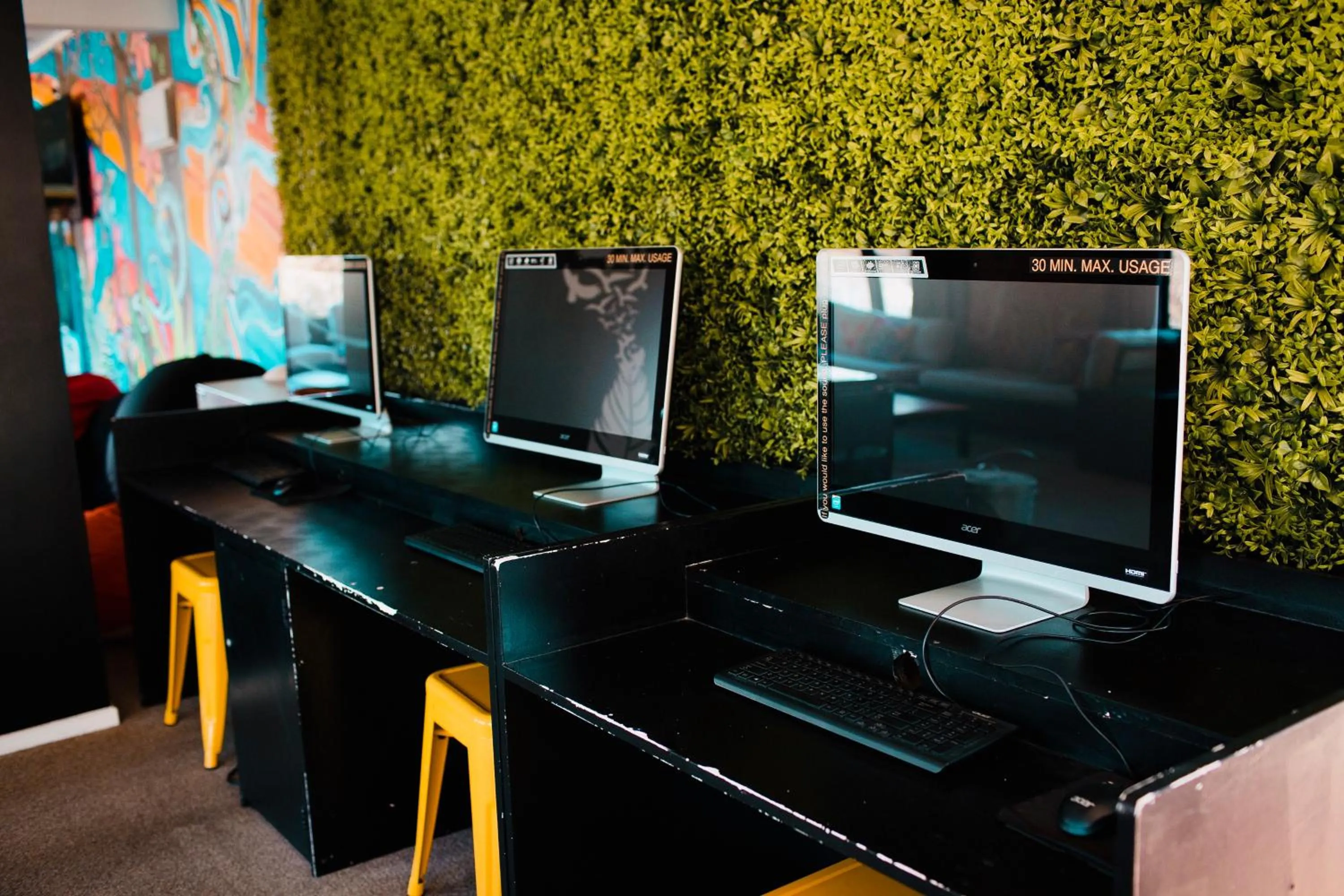 Communal lounge/ TV room in The Black Sheep Backpackers