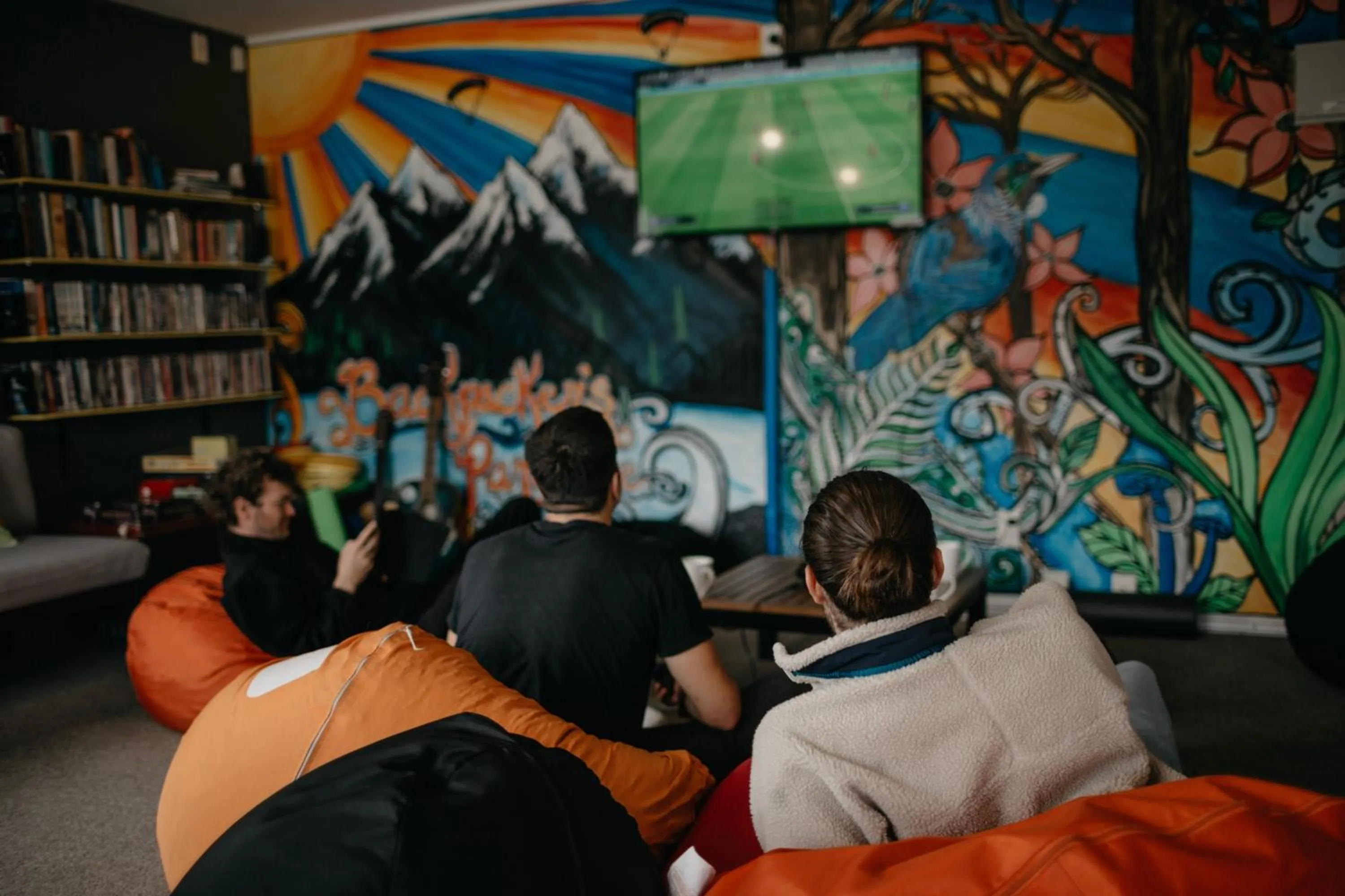 Communal lounge/ TV room in The Black Sheep Backpackers