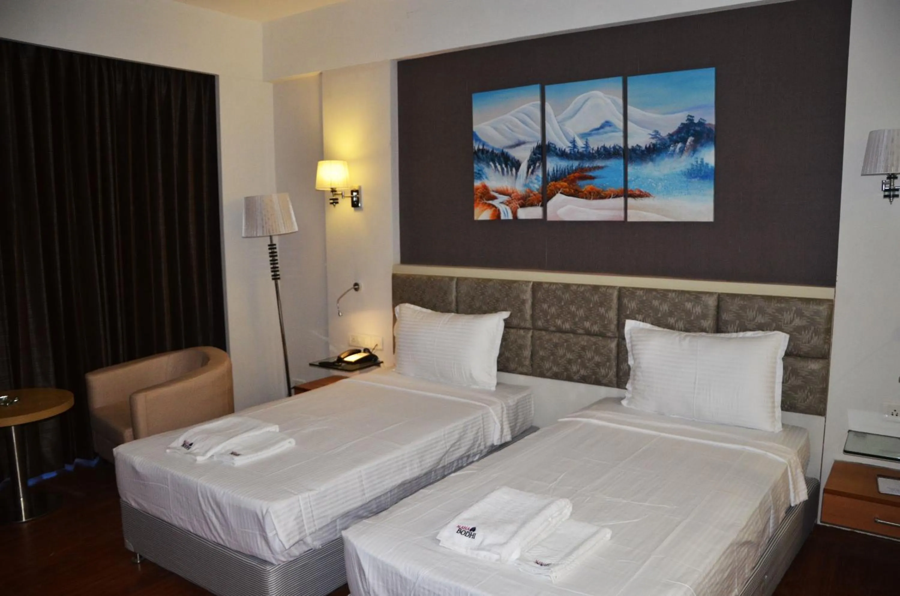 Bed in Maha Bodhi Hotel.Resort.Convention Centre