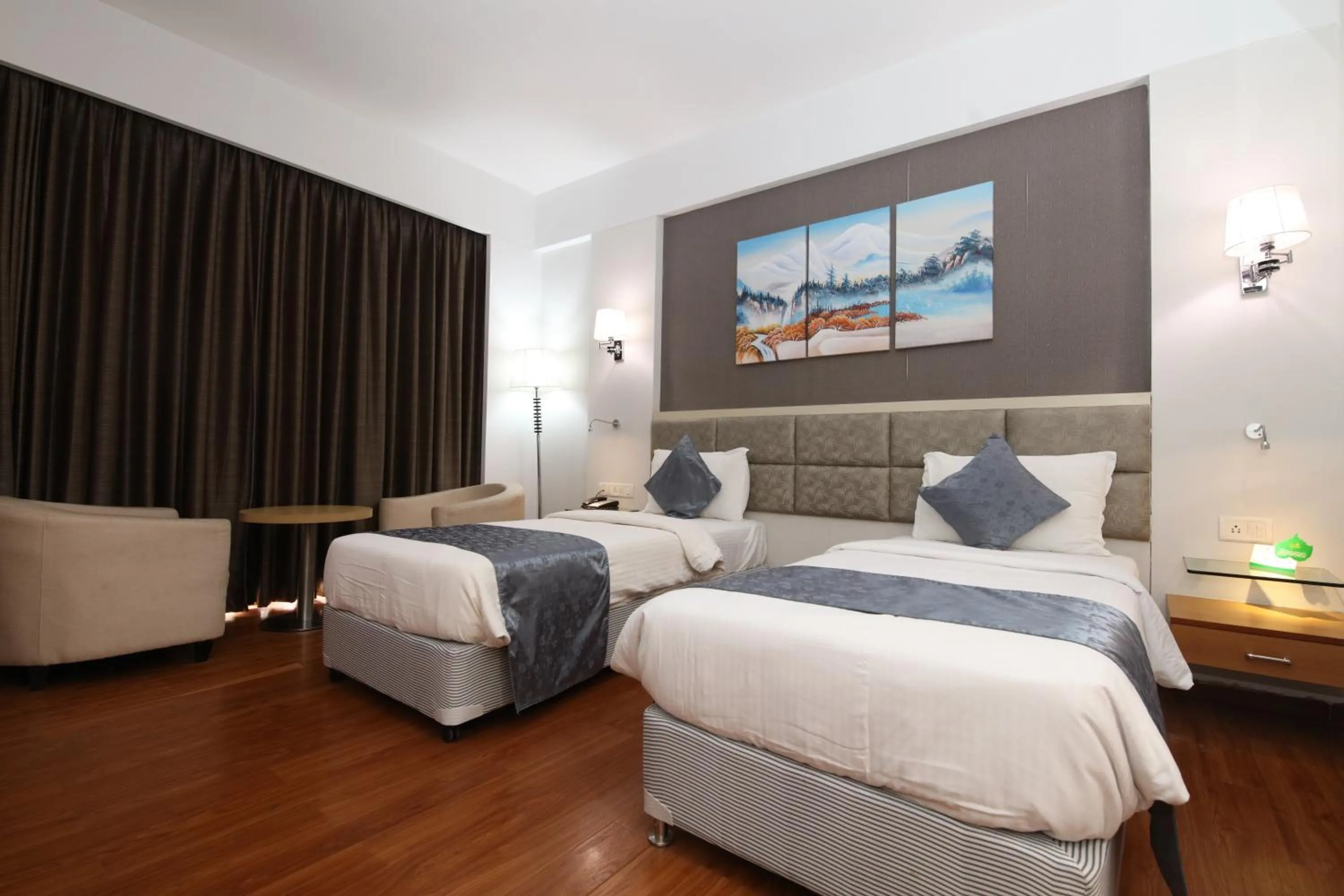 Bed in Maha Bodhi Hotel.Resort.Convention Centre