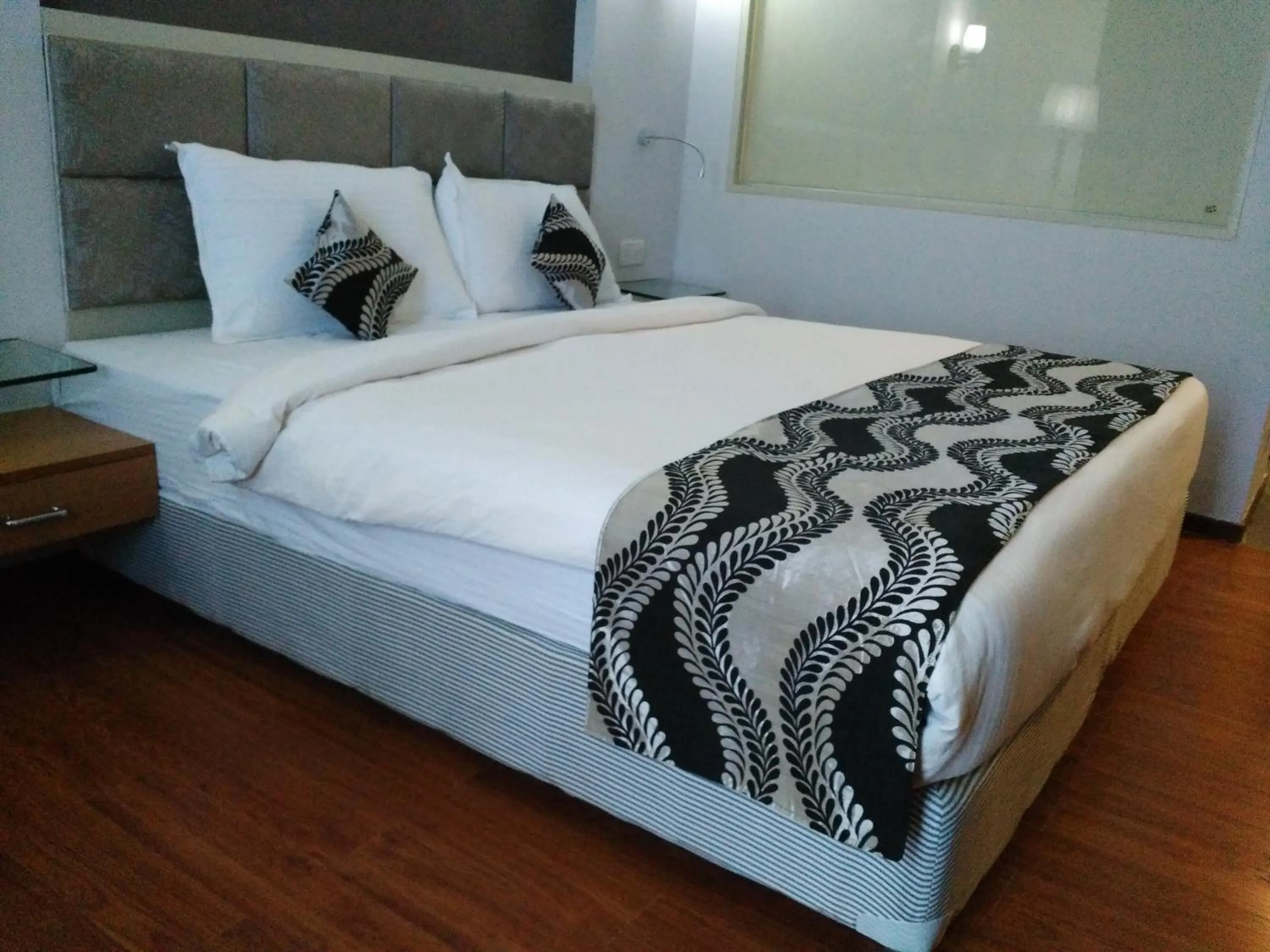 Photo of the whole room, Bed in Maha Bodhi Hotel.Resort.Convention Centre