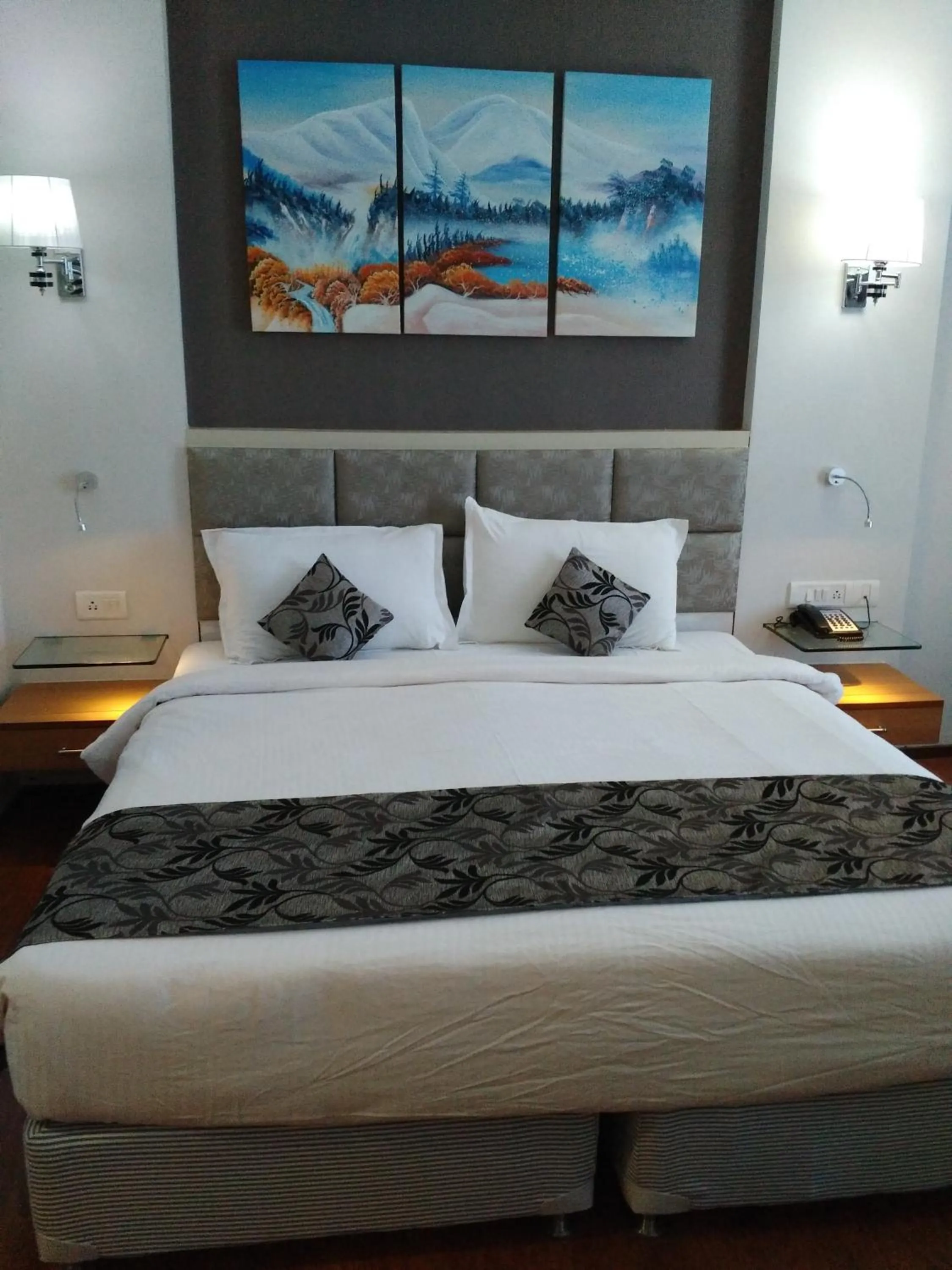 Photo of the whole room, Bed in Maha Bodhi Hotel.Resort.Convention Centre