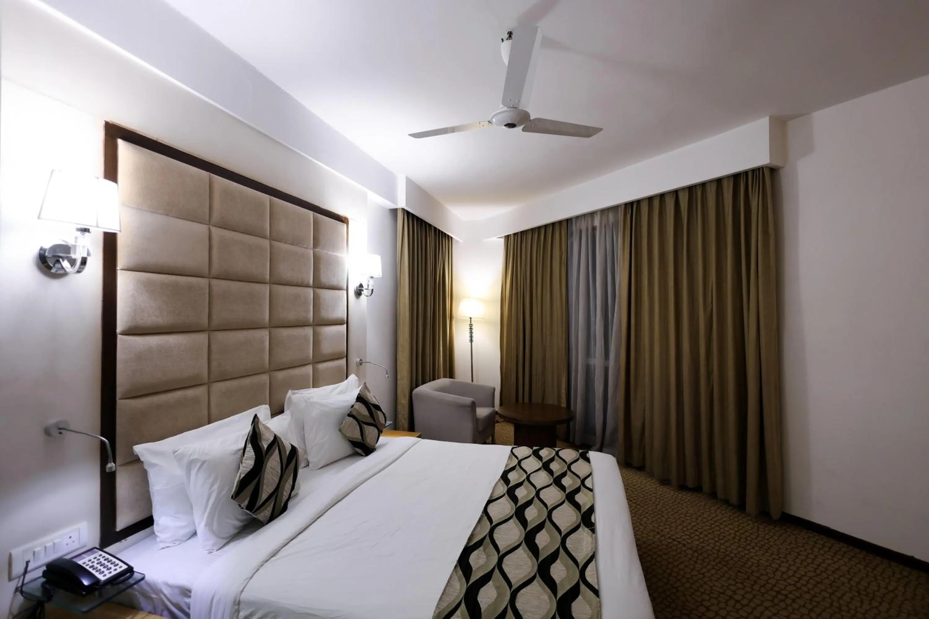 Photo of the whole room, Bed in Ramada by Wyndham Bodh Gaya Mahabodhi