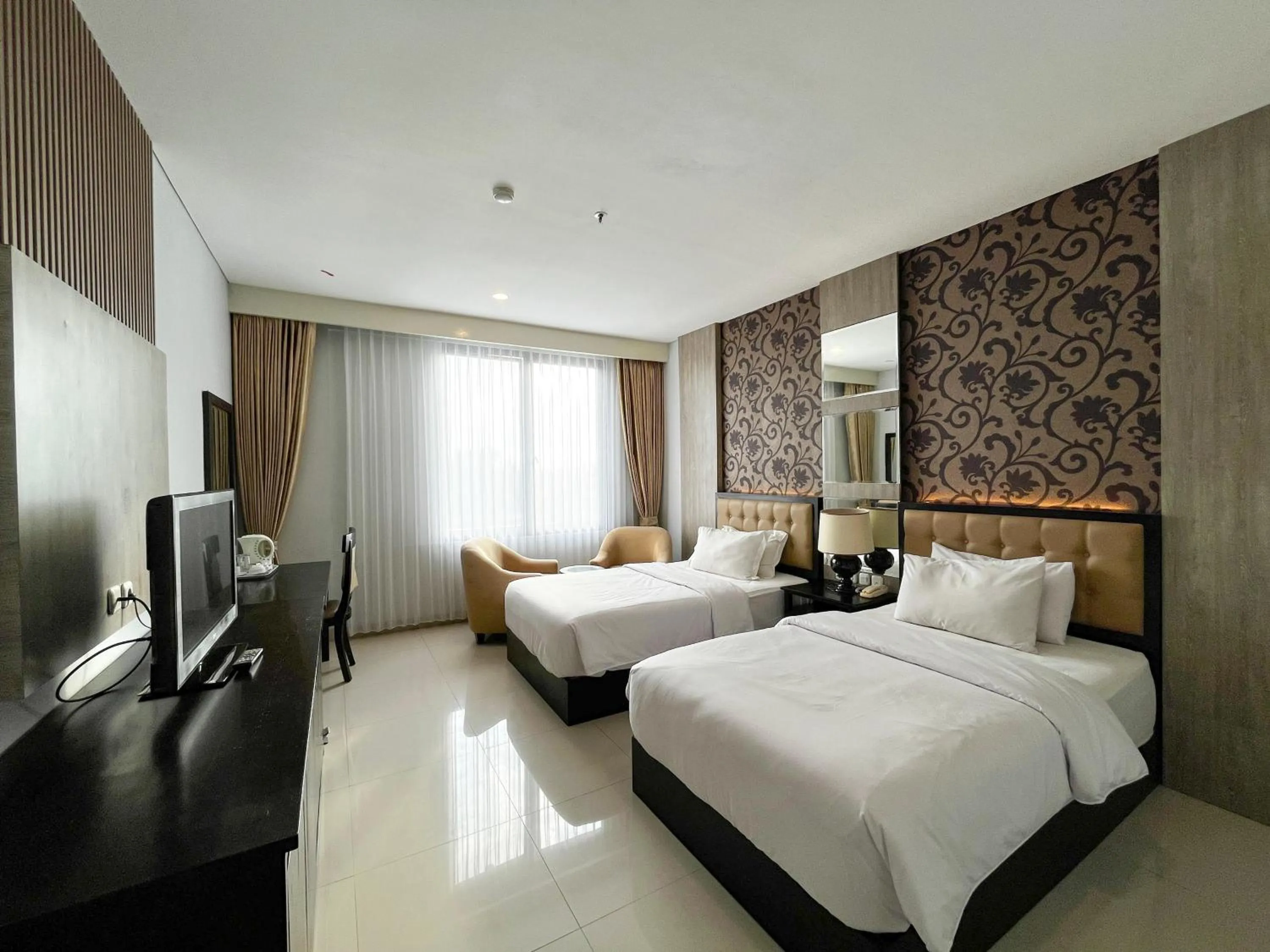 Bed in Azana Style Hotel Lovina Bali
