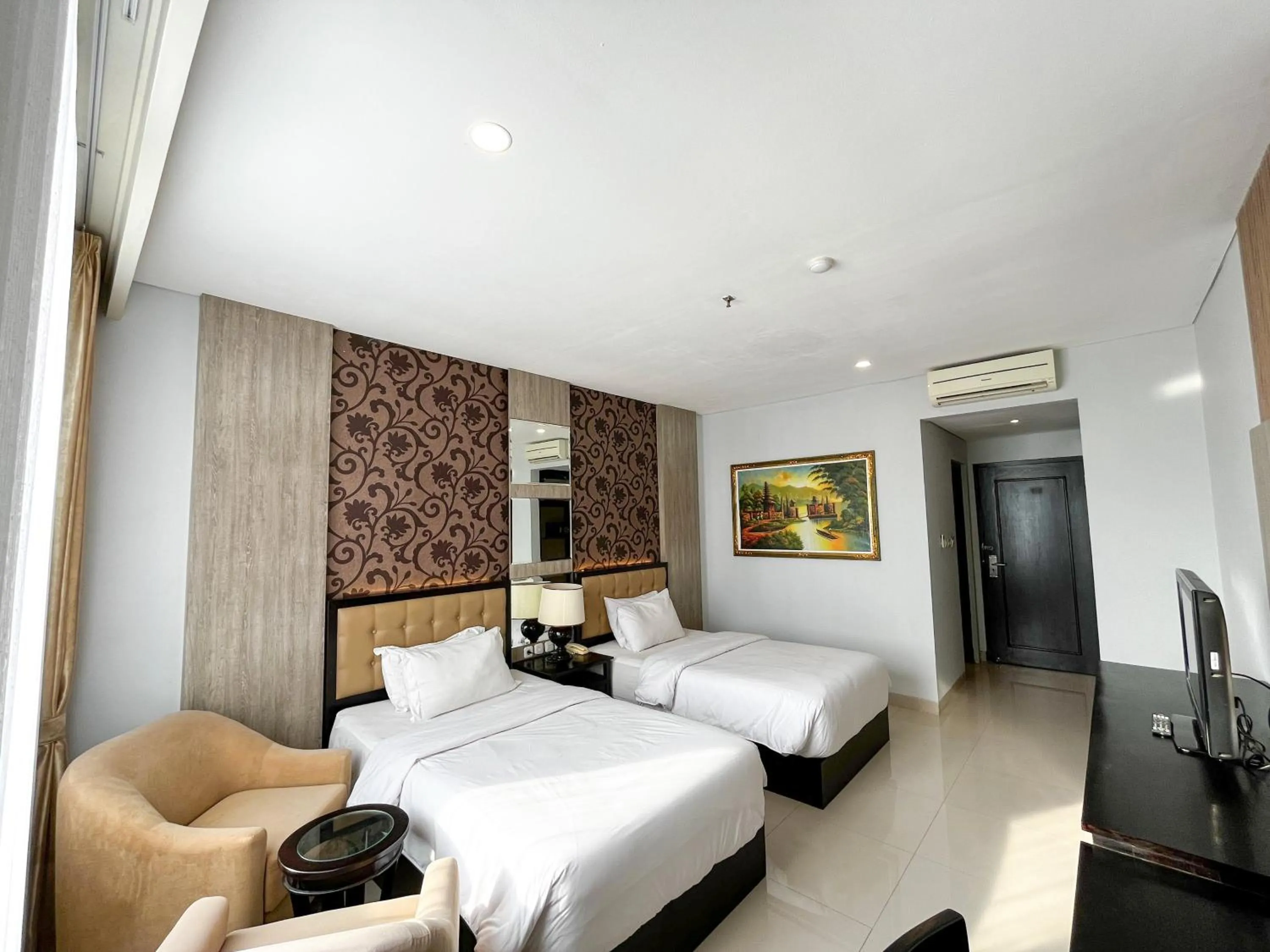 Bed in Azana Style Hotel Lovina Bali