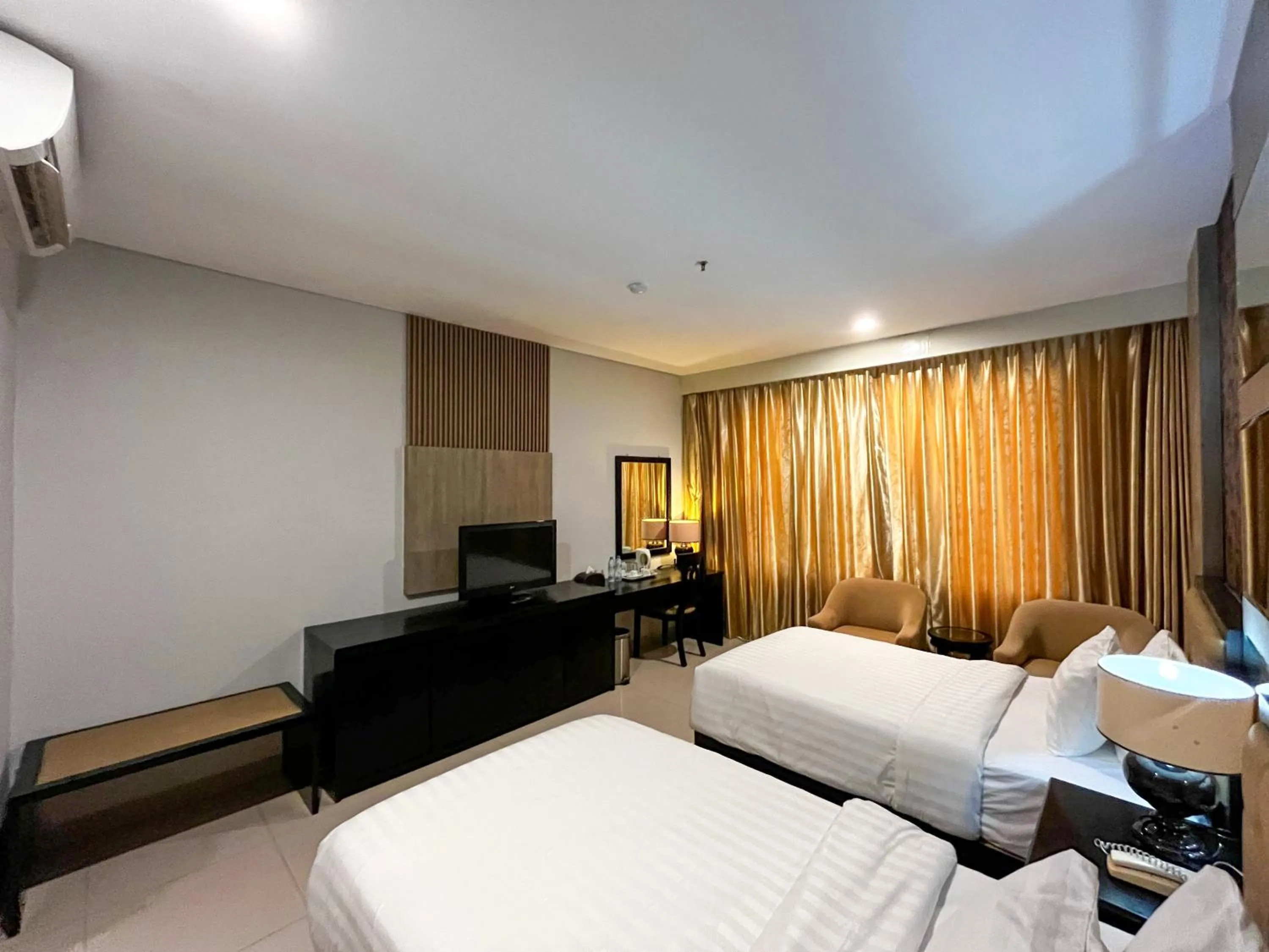 Bed in Azana Style Hotel Lovina Bali