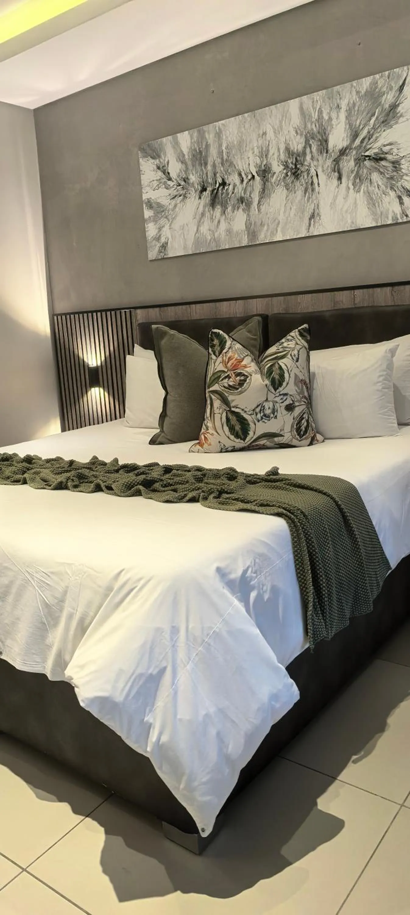 Bed in The Cycad Lodge & Chalets