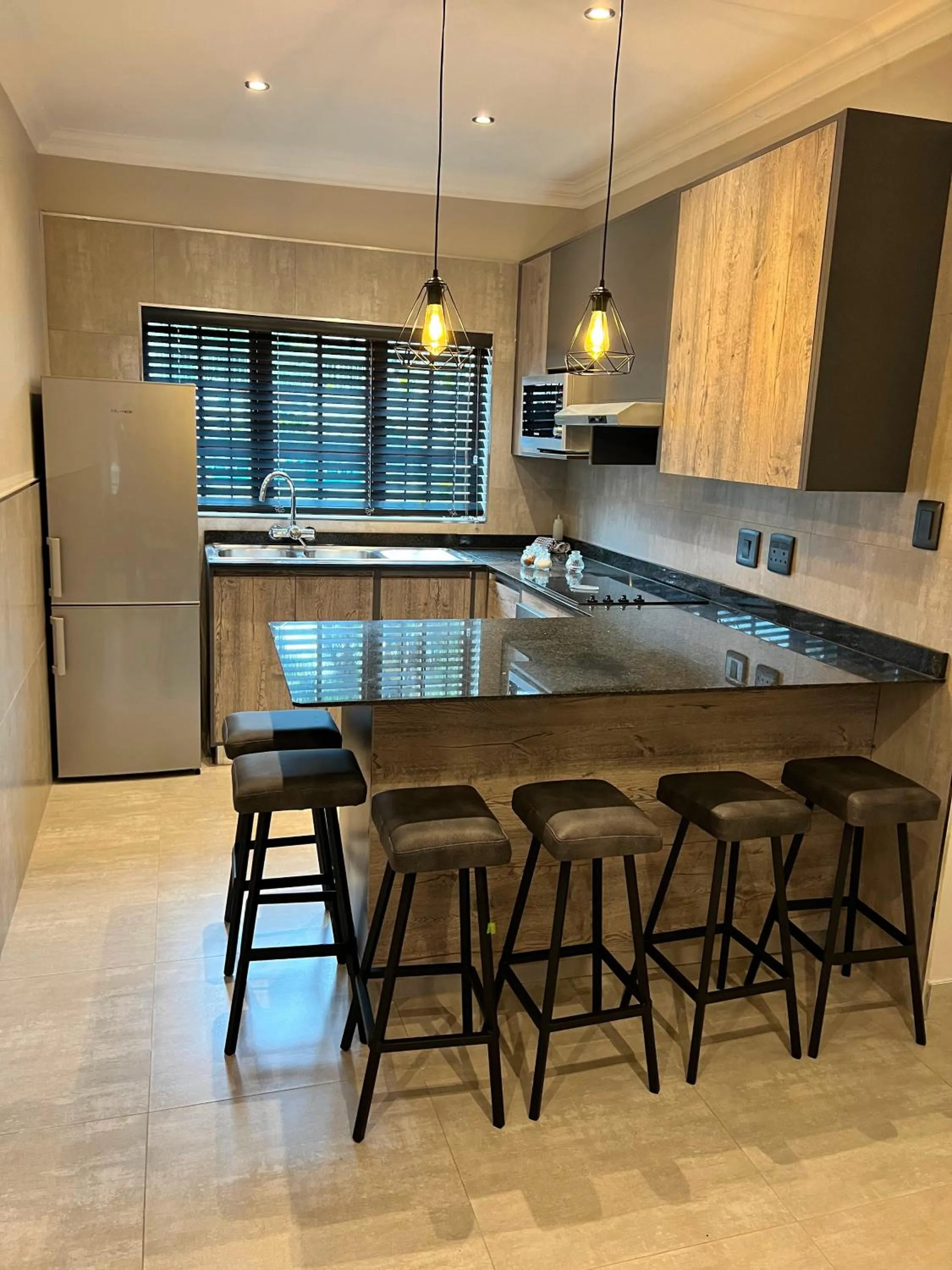 Kitchen or kitchenette in The Cycad Lodge & Chalets