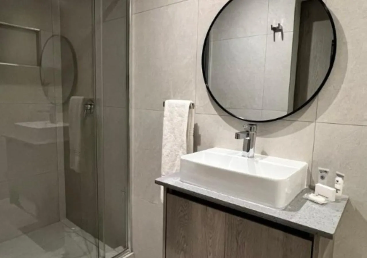 Bathroom in The Cycad Lodge & Chalets