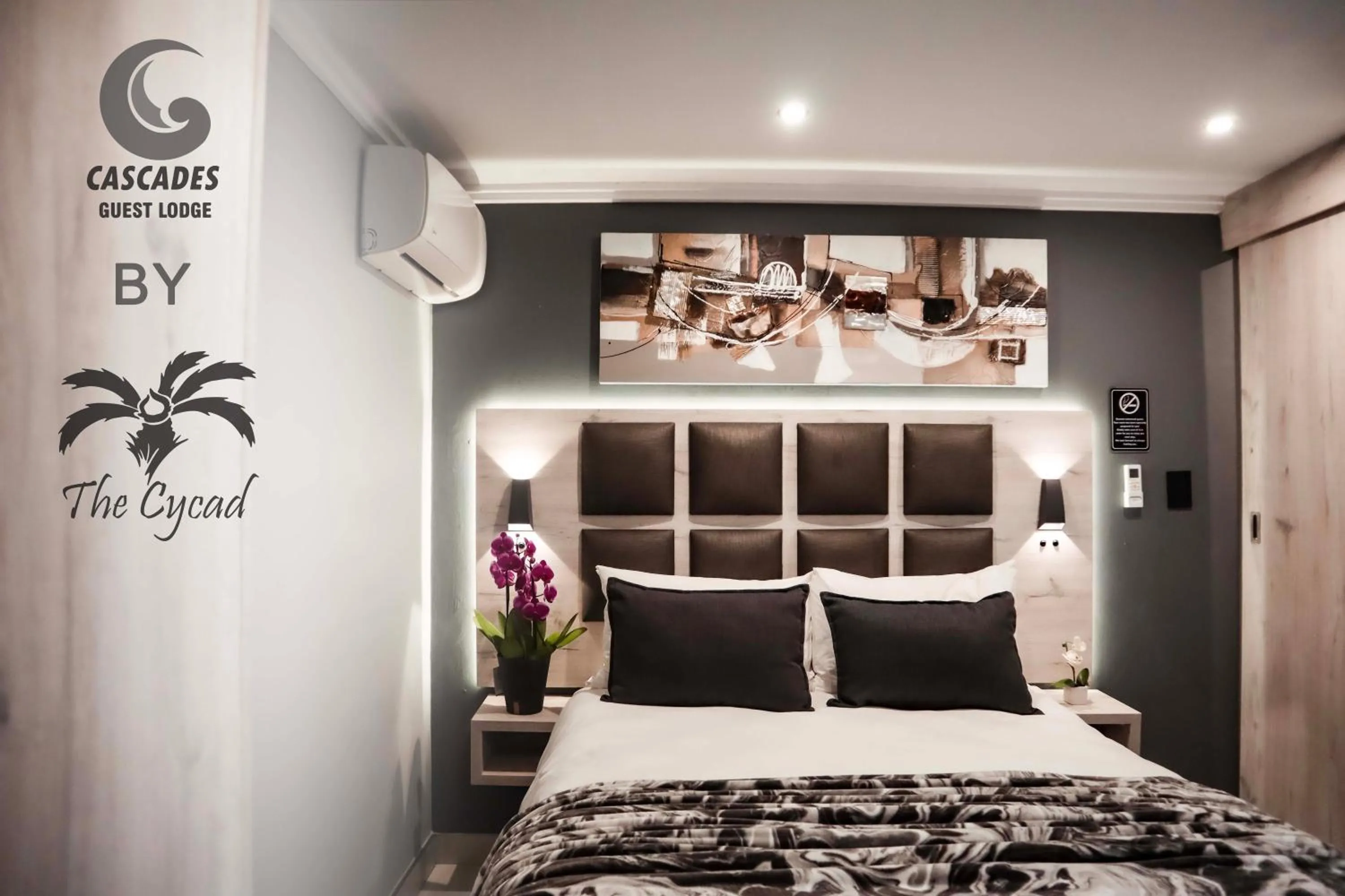 Bed in The Cycad Lodge & Chalets