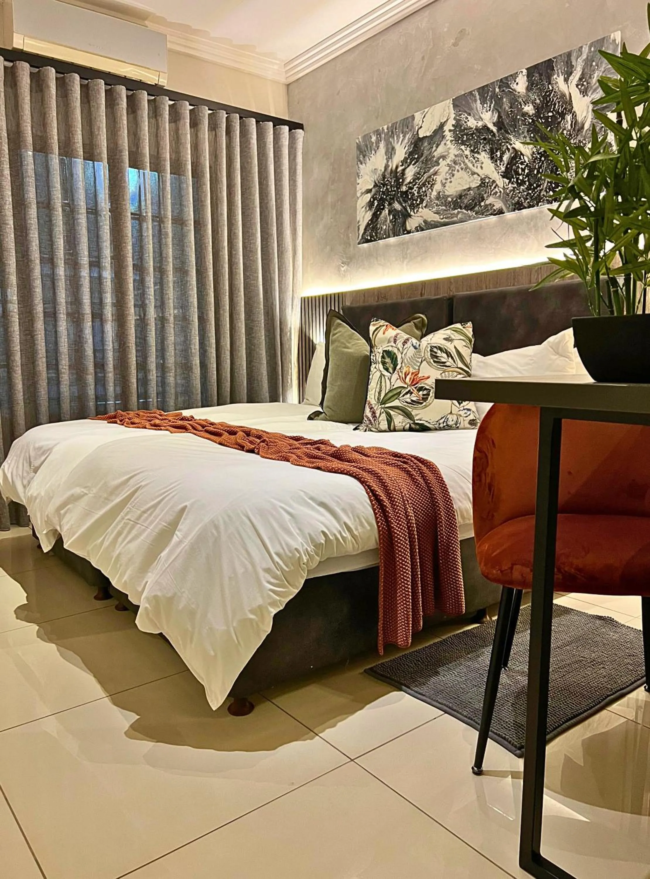 Bed in The Cycad Lodge & Chalets