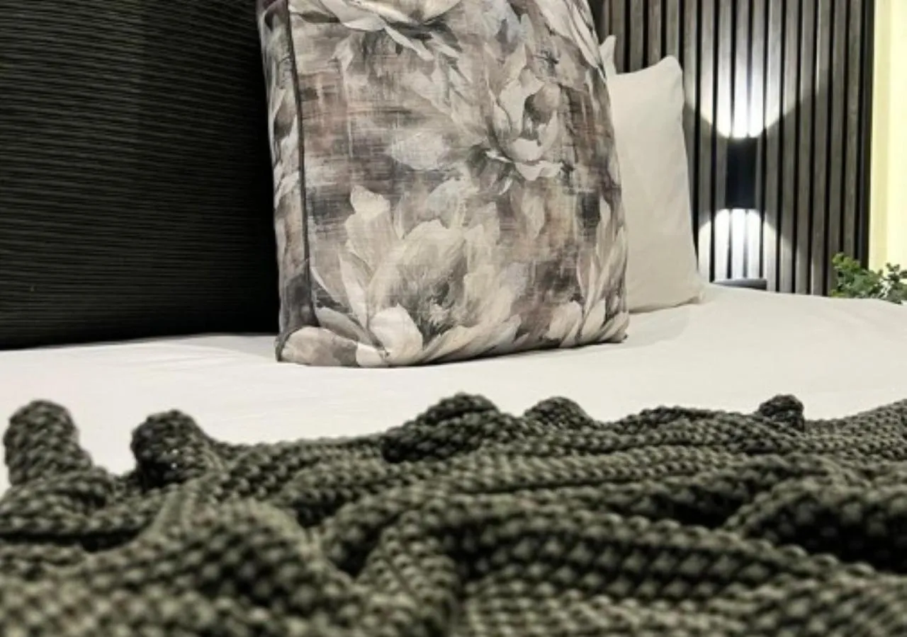 Bed in The Cycad Lodge & Chalets