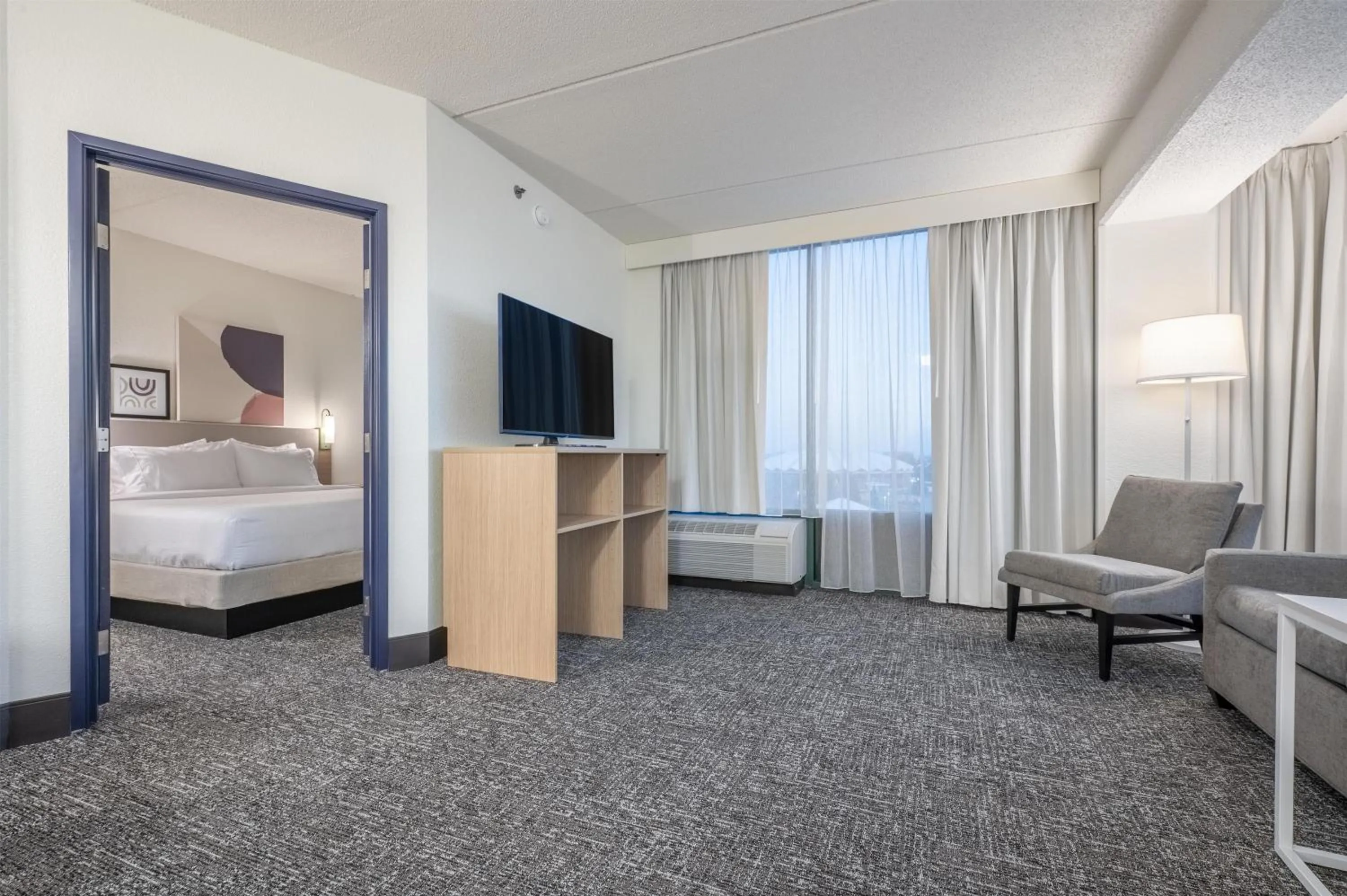 Living room, Bed in Spark By Hilton Madison Central