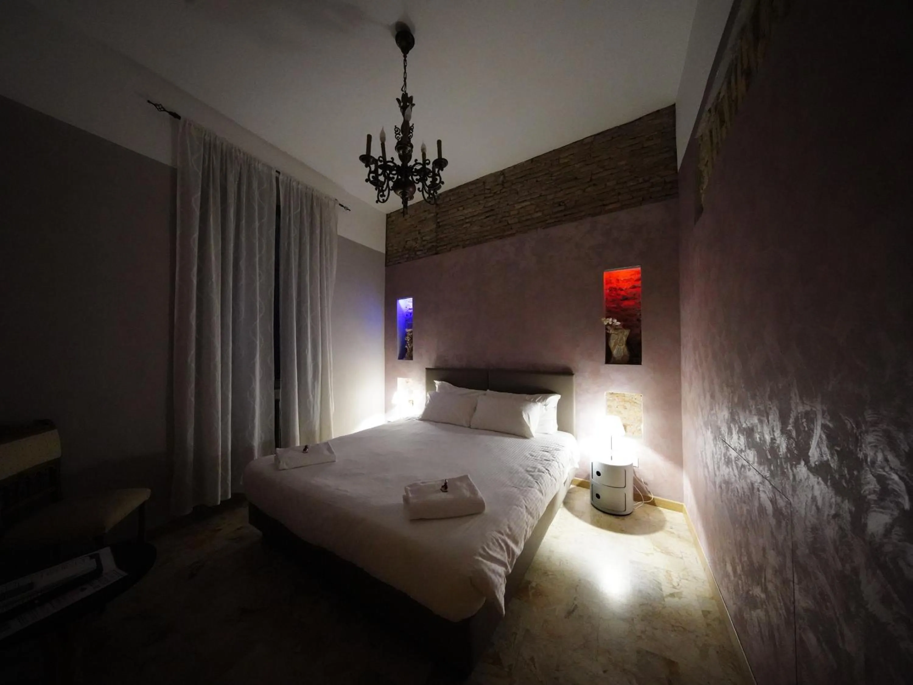 Bed in Nerva Accommodation Cavour