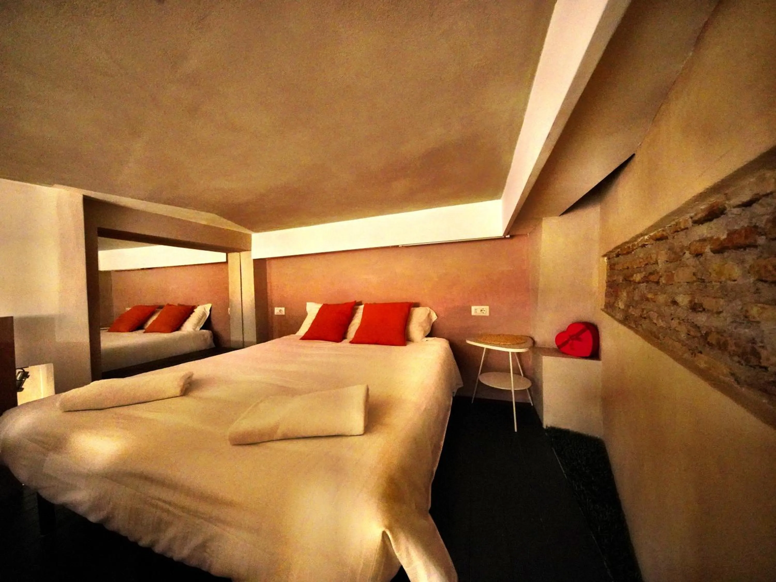 Bed in Nerva Accommodation Cavour