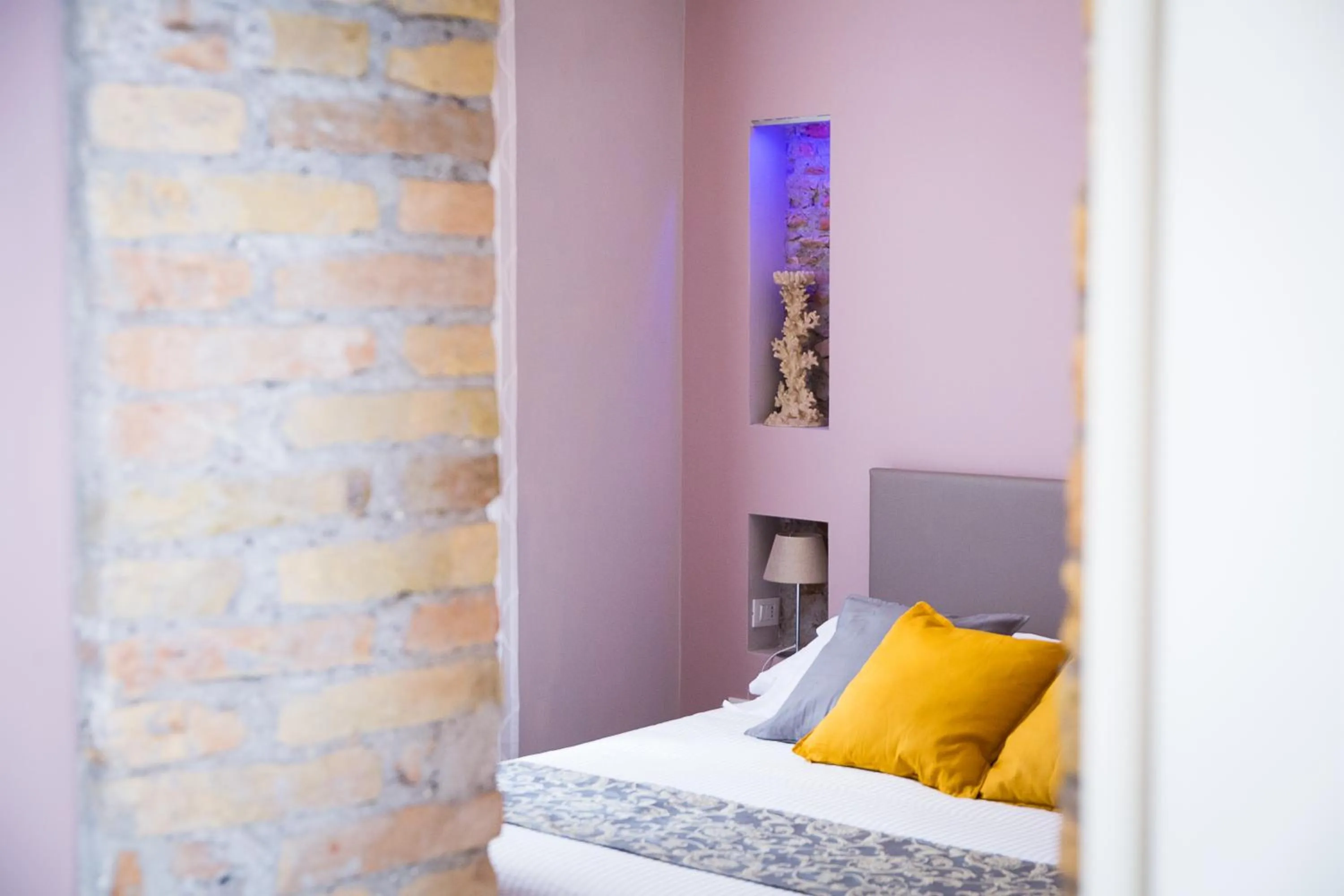 Bed in Nerva Accommodation Cavour