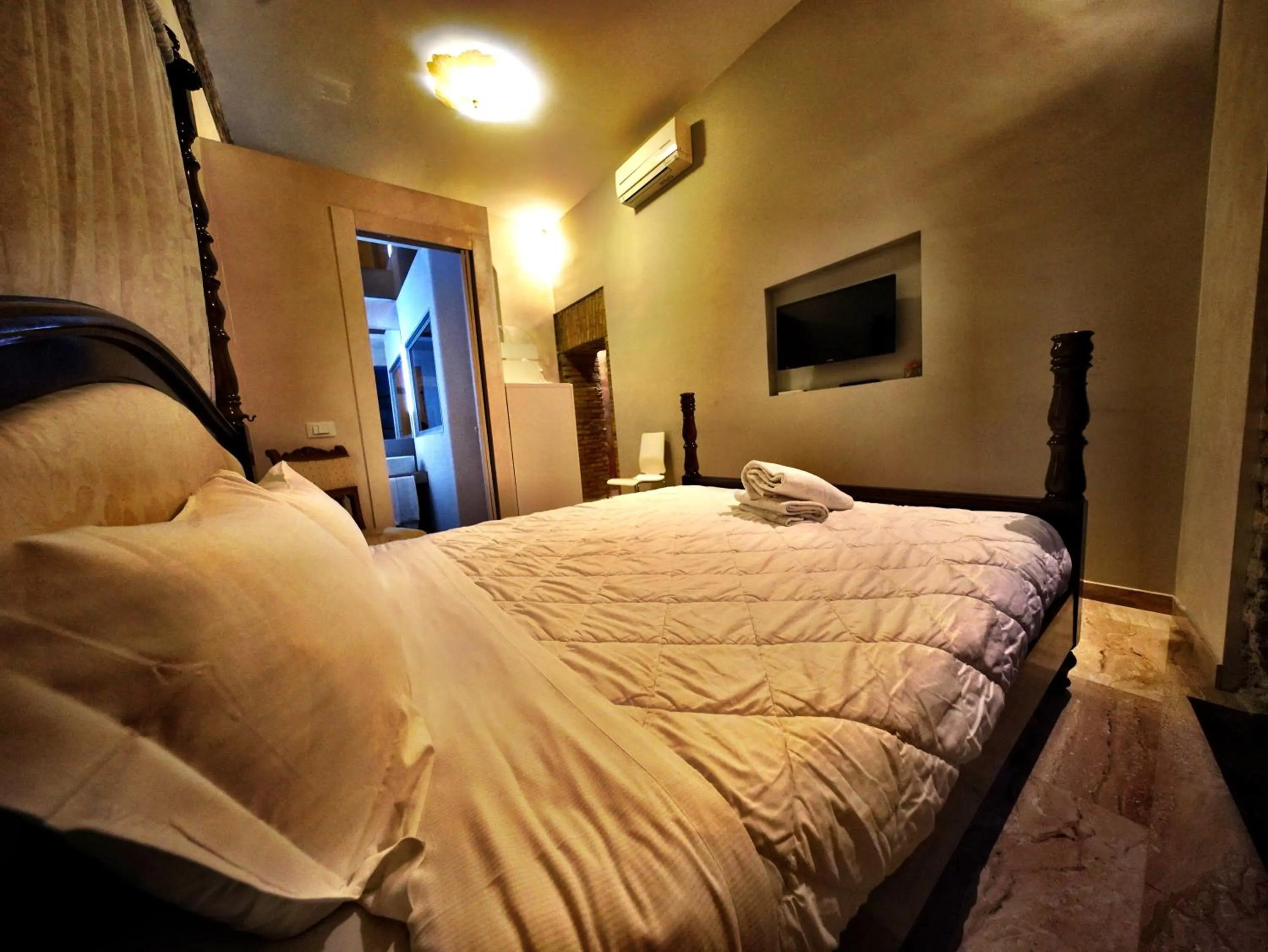 Bed in Nerva Accommodation Cavour