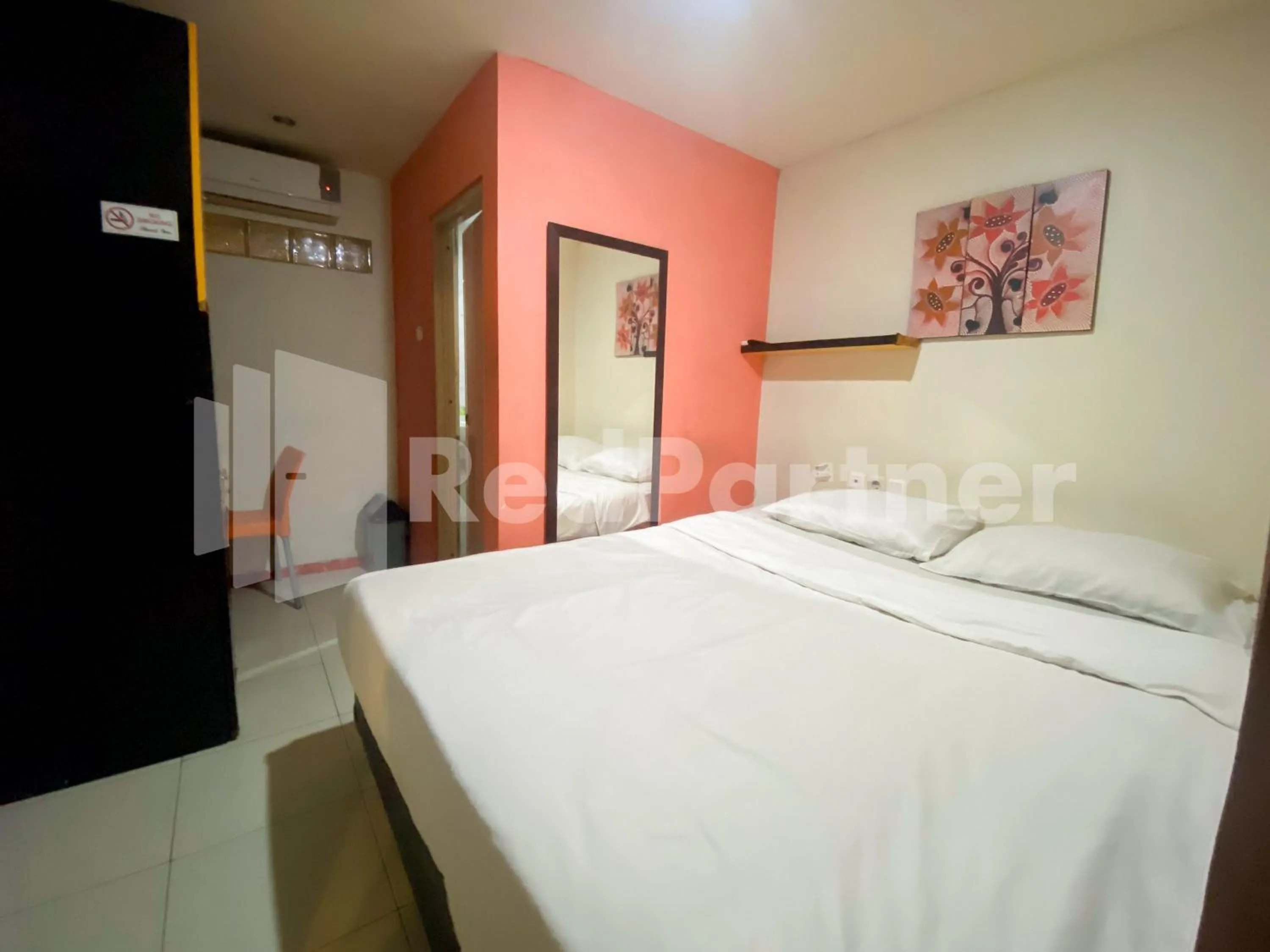 Bedroom, Bed in Audah Guesthouse Syariah RedPartner