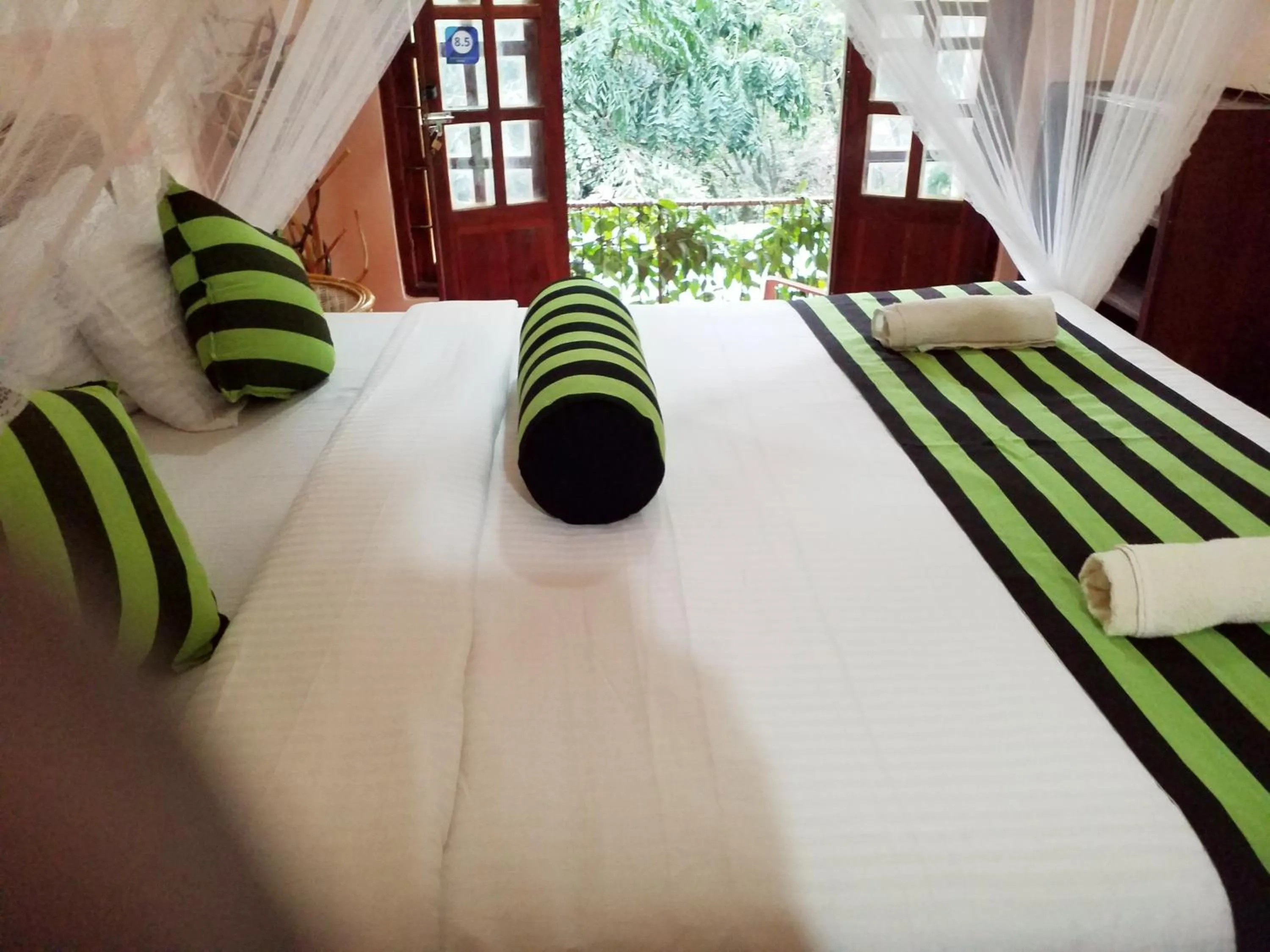 Bed in Ella Green Cottages