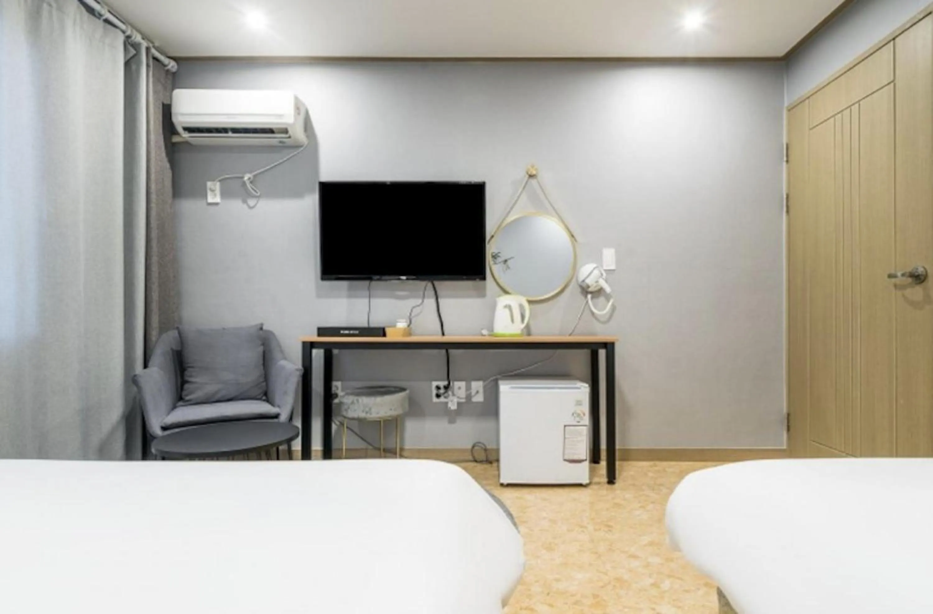 Bed in Jeju Pure Stay Ocean